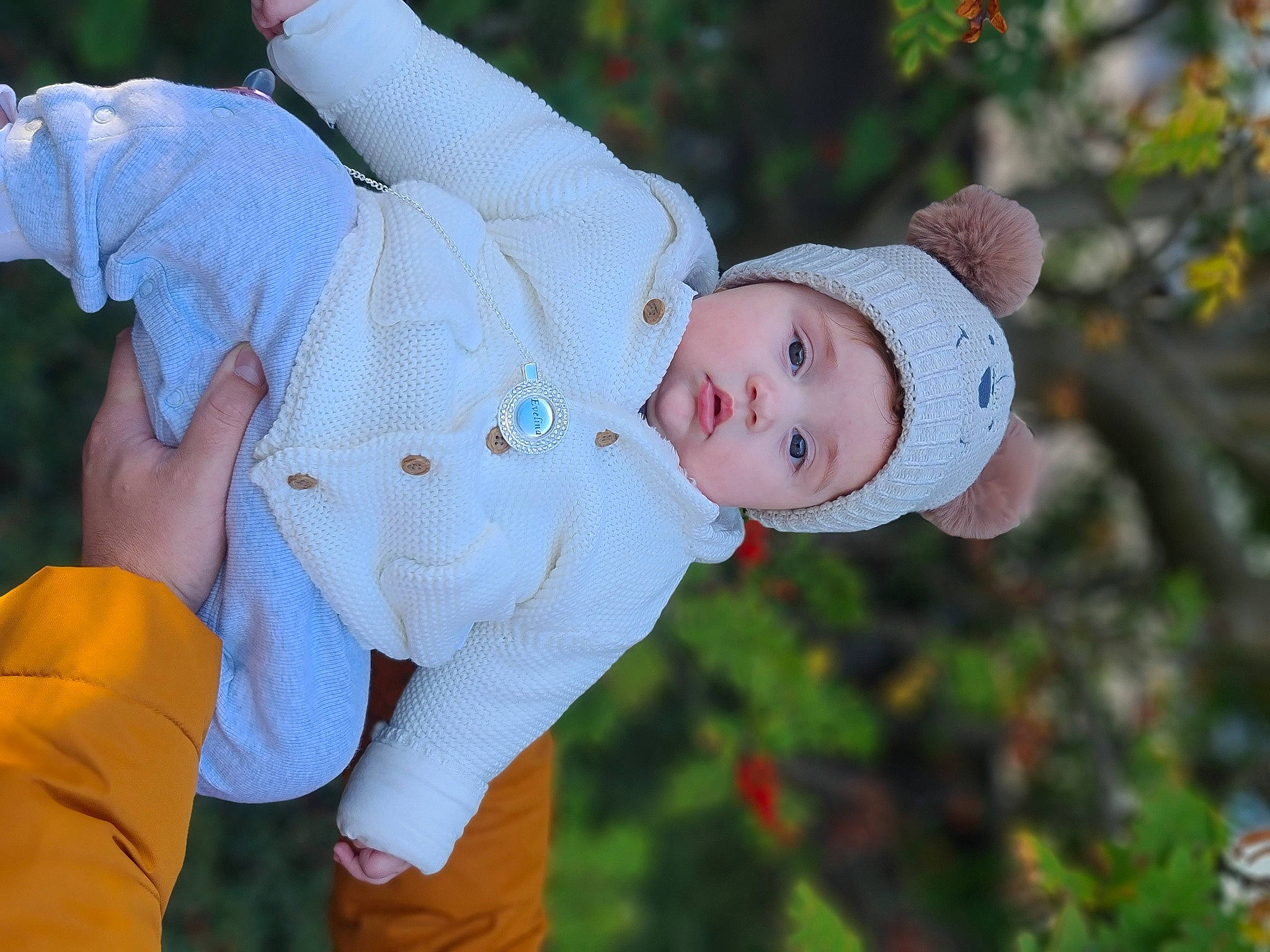 Evelina joined the competition — help win amazing prizes! baby, baby_toddler_clothing, child, event, fun, gesture, grass, happy, hat, headwear, leisure, pattern, people_in_nature, person, plant, portrait_photography, sitting, sun_hat, toddler, tree