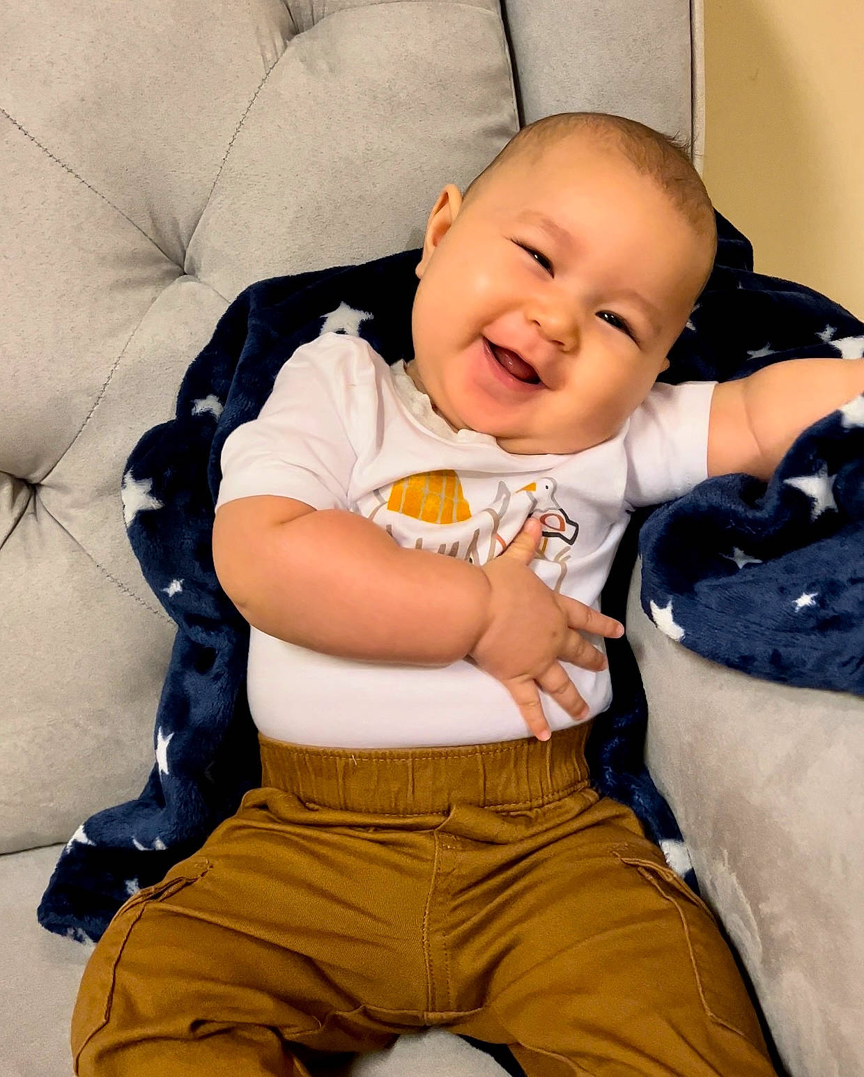 Lemuel joined the competition — help win amazing prizes! baby, baby_products, baby_toddler_clothing, cheek, child, comfort, eye, fun, happy, joy, khaki_pants, linens, person, product, sitting, skin, sleeve, smile, t_shirt, textile
