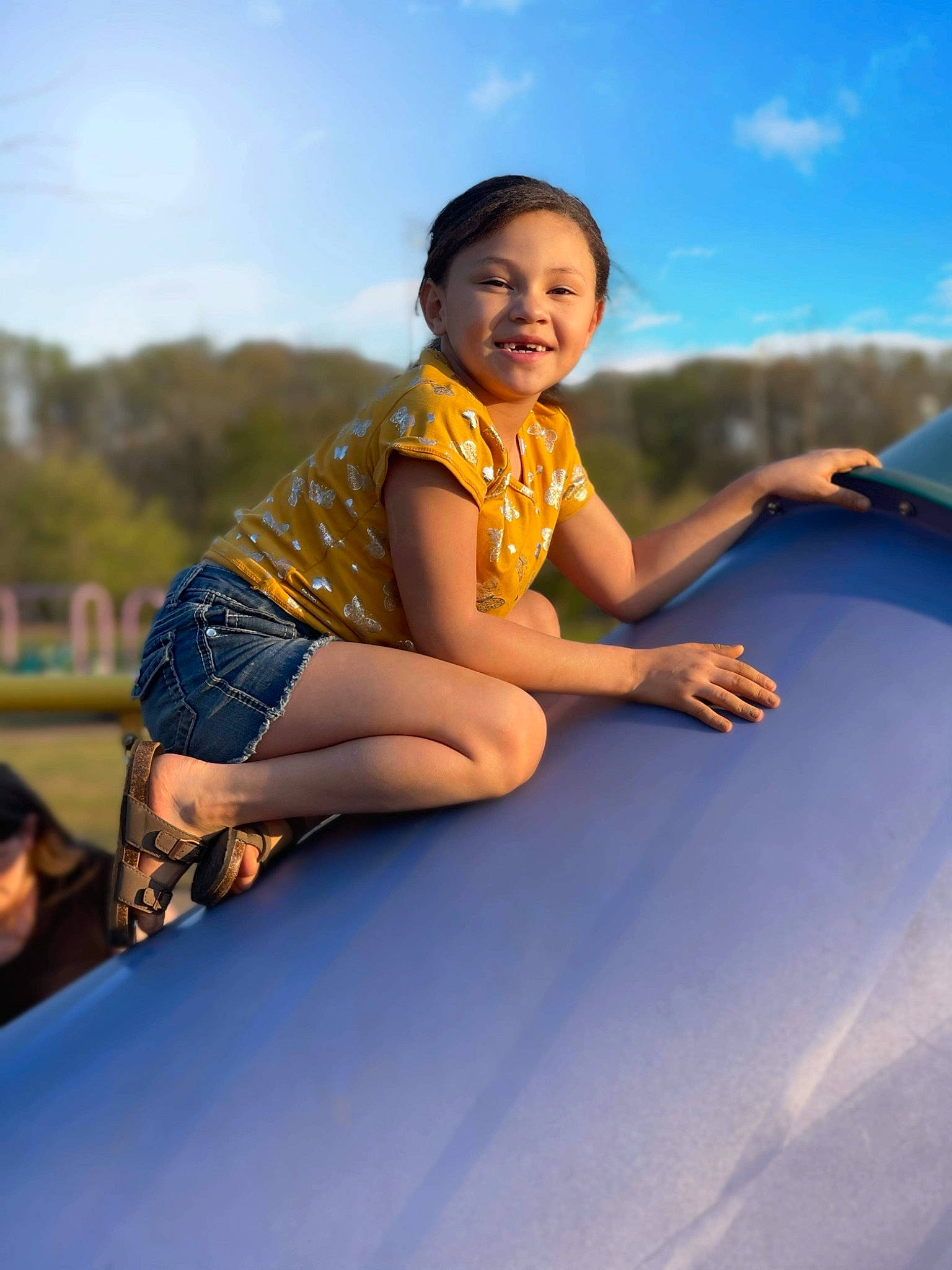 Kaleigha joined the competition — help win amazing prizes! azure, beauty, cloud, daytime, electric_blue, flash_photography, fun, happy, hood, human_leg, joy, knee, leisure, person, recreation, sky, smile, sunlight, thigh, toddler