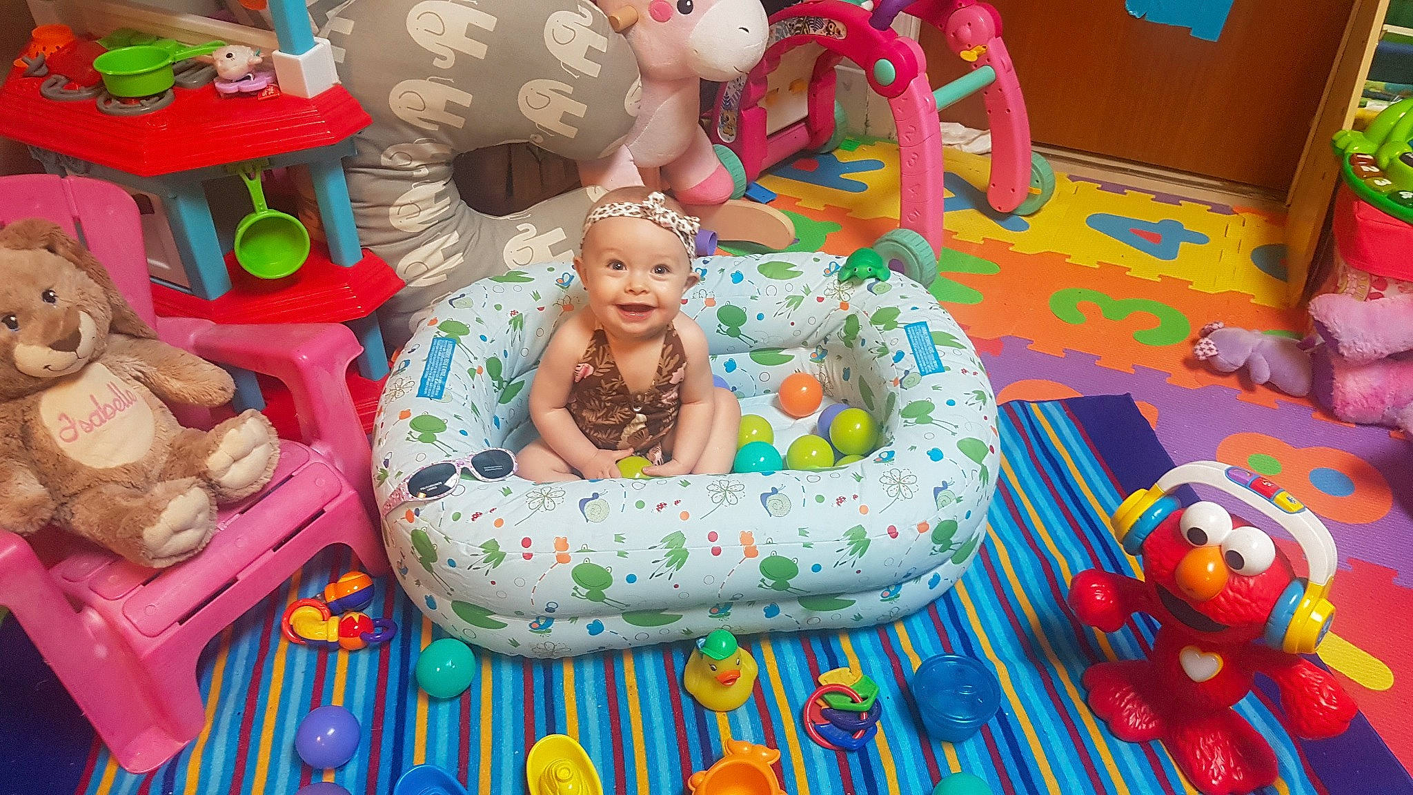 Izabelle is registered to the contest to win money with this photo: art, baby, baby_products, baby_toys, baked_goods, child, comfort, doll, event, fun, headwear, joy, leisure, linens, person, pink, play, product, room, stuffed_toy