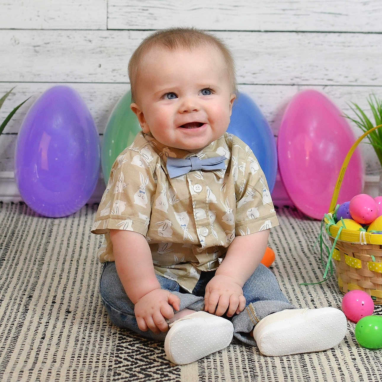 Evander is registered to the contest to win money with this photo: accessories, baby, balloon, egg, face, food, formalwear, head, jar, people, person, photography, plant, planter, portrait, pottedplant, pottery, purple, sitting, tie