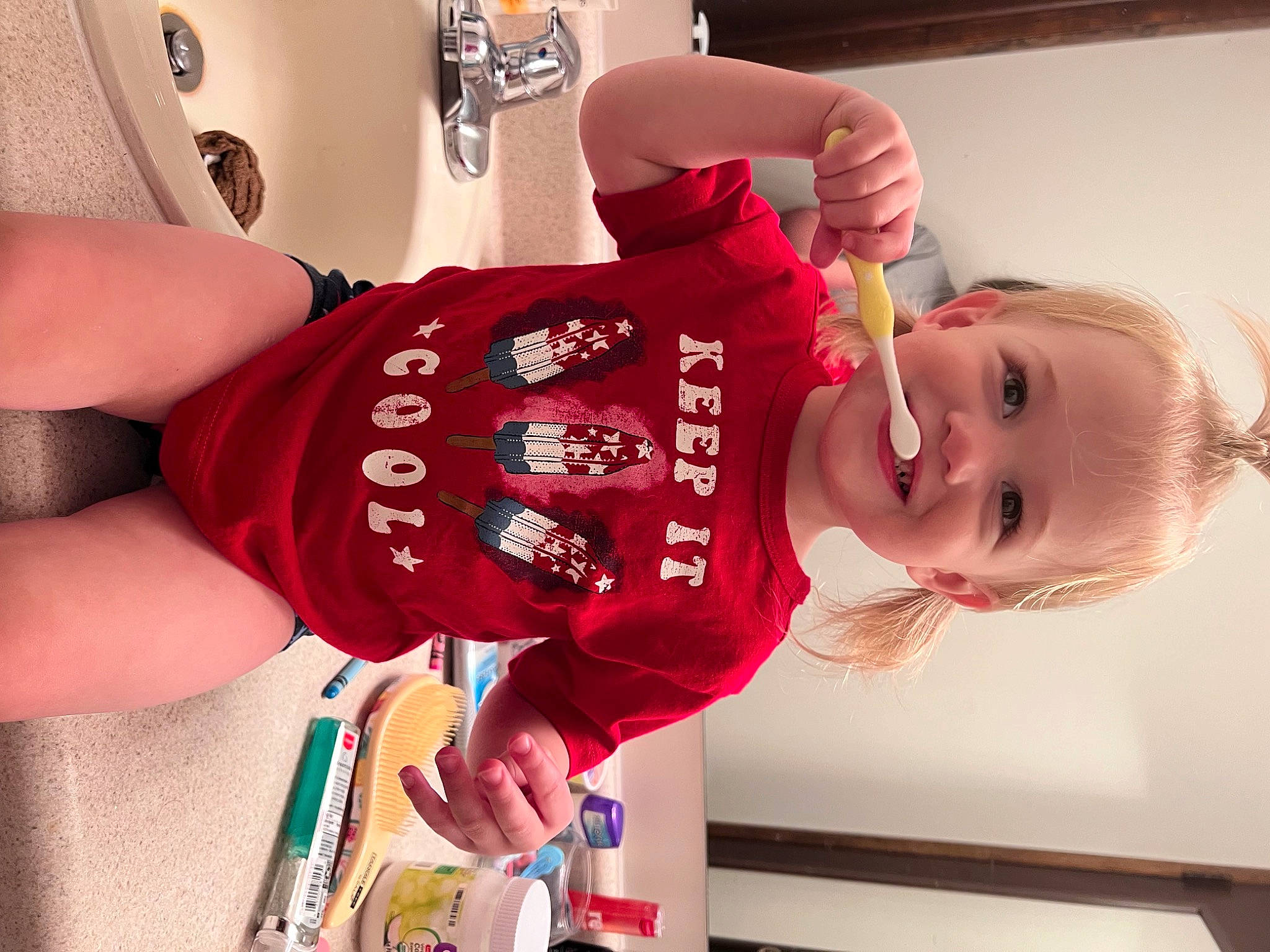 Amelia is registered to the contest to win money with this photo: arm, baby, baby_toddler_clothing, carmine, chest, child, elbow, finger, fun, happy, human_leg, joy, magenta, person, room, sleeve, smile, sportswear, t_shirt, thigh