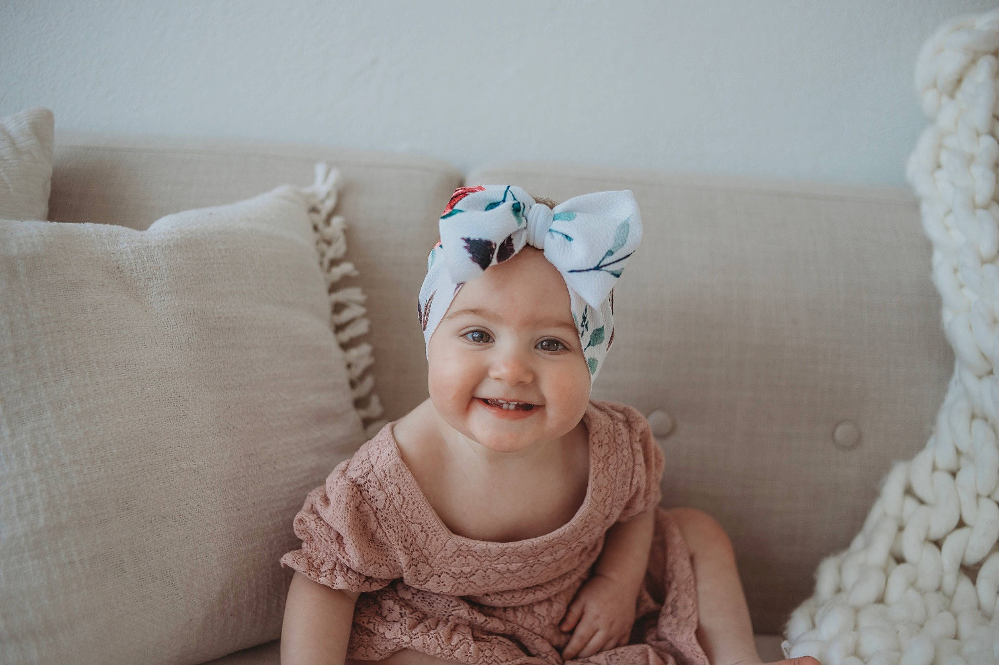 Addalyn joined the competition — help win amazing prizes! baby, baby_toddler_clothing, child, comfort, couch, eye, face, facial_expression, flash_photography, happy, headgear, headpiece, headwear, iris, joy, linens, person, skin, sleeve, smile