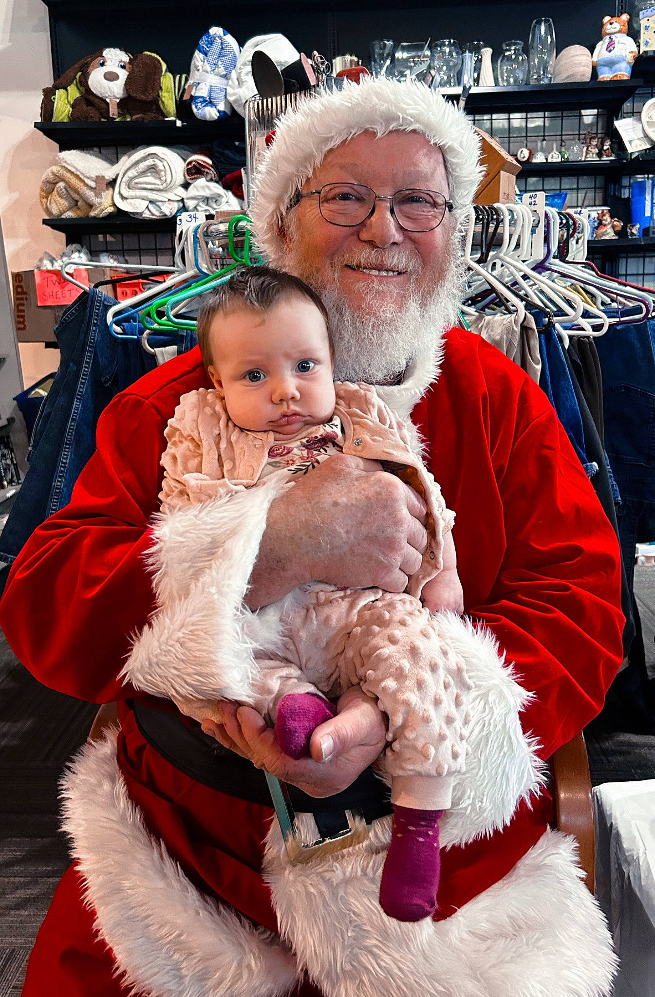 June Lee is registered to the contest to win money with this photo: beard, child, companion_dog, event, fun, fur, glasses, happy, hat, headwear, holiday, joy, lap, organ, person, photograph, santa_claus, smile, snapshot, textile