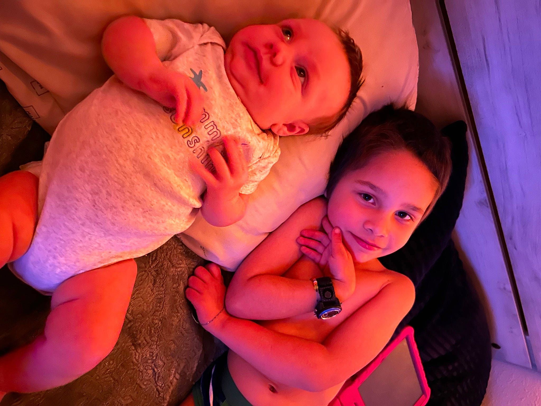 Demitri Lee is registered to the contest to win money with this photo: baby, eye, facial_expression, finger, flash_photography, gesture, hand, happy, head, human, human_body, joy, lip, mammal, mouth, nose, orange, person, pink, purple