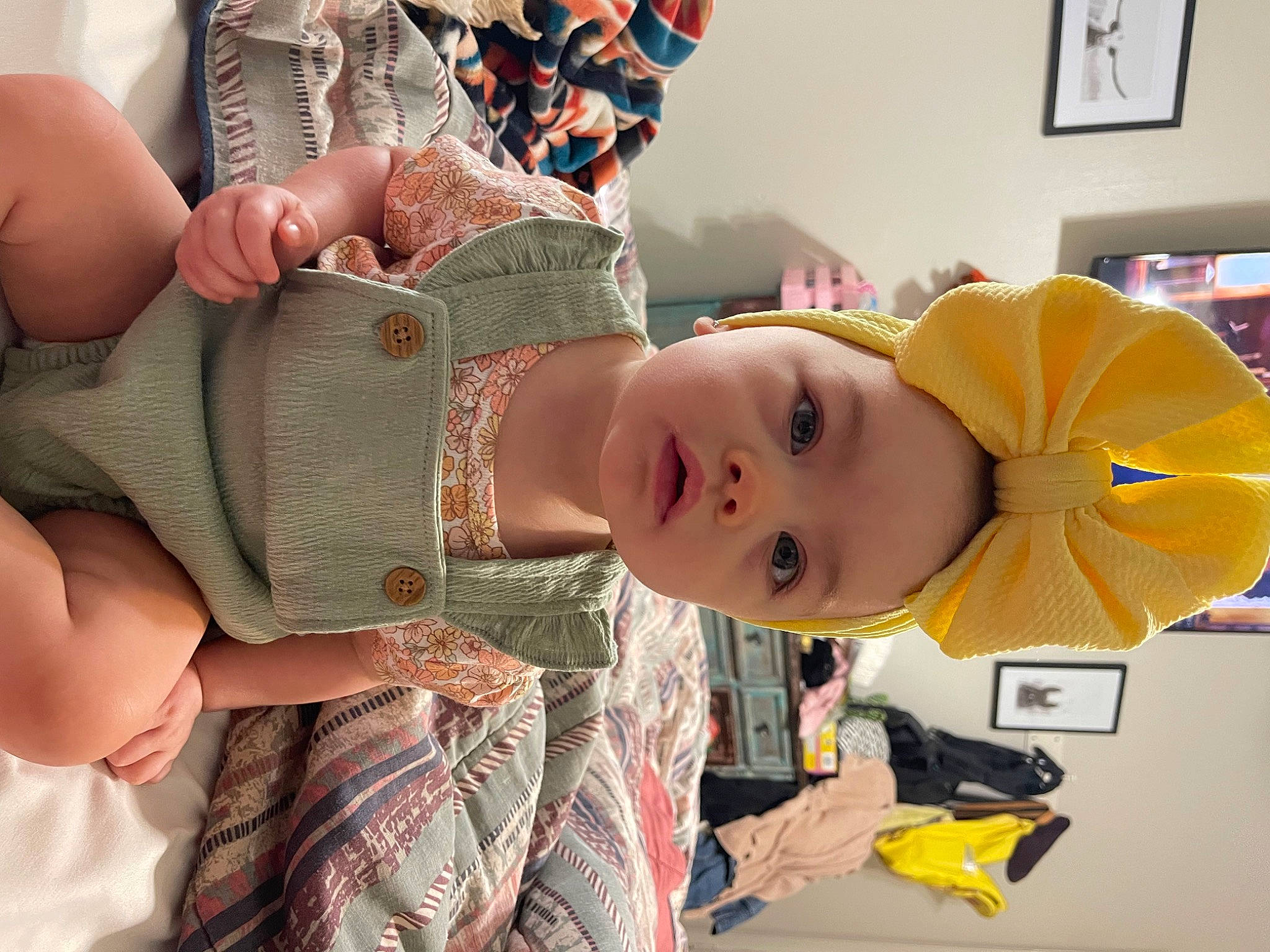 Jodie is registered to the contest to win money with this photo: abdomen, baby, baby_products, baby_toddler_clothing, chest, child, fashion_accessory, fun, happy, hat, jewellery, pattern, peach, person, picture_frame, room, thigh, toddler, trunk, wrist