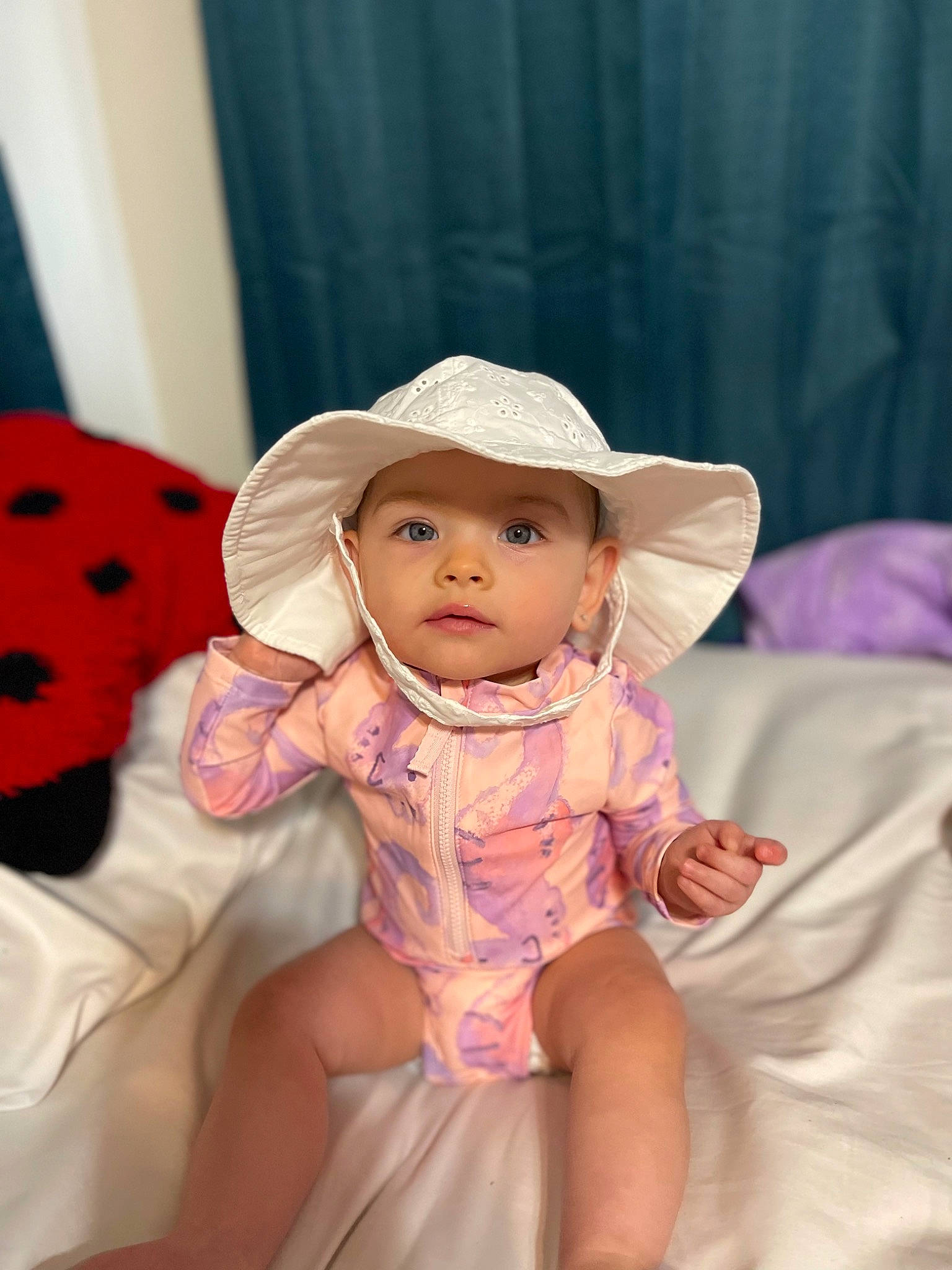 Jodie joined the competition — help win amazing prizes! baby, baby_toddler_clothing, cheek, child, comfort, facial_expression, fashion_accessory, fun, happy, hat, headgear, headwear, lip, pattern, person, pink, sitting, skin, sleeve, smile