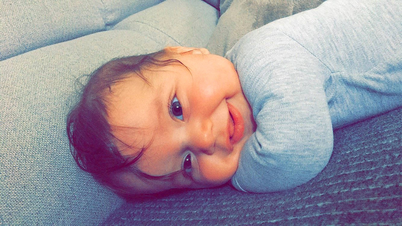 Mya participe au concours pour gagner de l'argent avec cette photo : azure, baby, baby_toddler_clothing, cheek, comfort, electric_blue, eyebrow, flash_photography, flooring, fun, grass, happy, iris, lip, mouth, nose, person, skin, smile, toddler