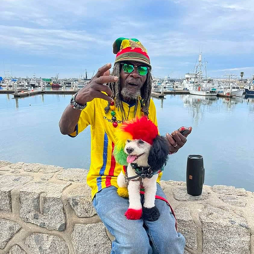 Alitherastapup is registered to the contest to win money with this photo: cloud, coast, companion_dog, costume, event, fun, fur, happy, lake, leisure, ocean, recreation, sitting, sky, stuffed_toy, tourism, toy, travel, vacation, water