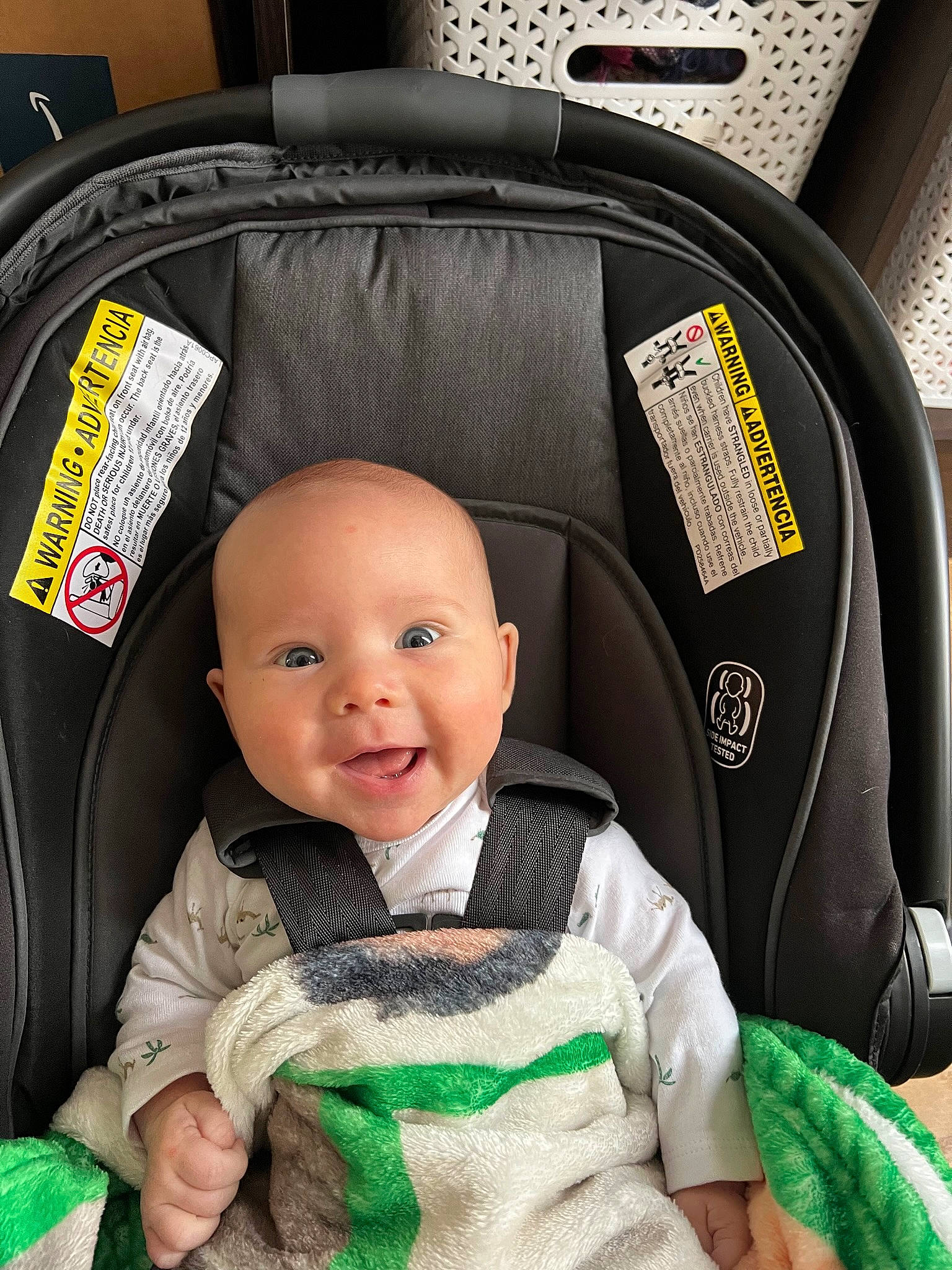 Logan is registered to the contest to win money with this photo: auto_part, automotive_design, baby, baby_carriage, baby_in_car_seat, baby_products, baby_toddler_clothing, car_seat, car_seat_cover, child, comfort, family_car, green, head_restraint, joy, motor_vehicle, person, seat_belt, sitting, smile
