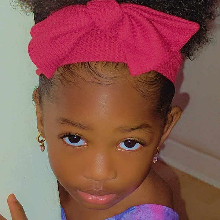 Ja'Hara joined the competition — help win amazing prizes! accessories, baby, bodypart, clothing, doll, dress, face, fashion, finger, formalwear, gown, hand, hat, head, headband, jewelry, person, photography, portrait, toy