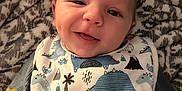 Wyatt is registered to the contest to win money with this photo: baby, babylaughing, bib, face, happy, head, person, photography, portrait, skin, tattoo