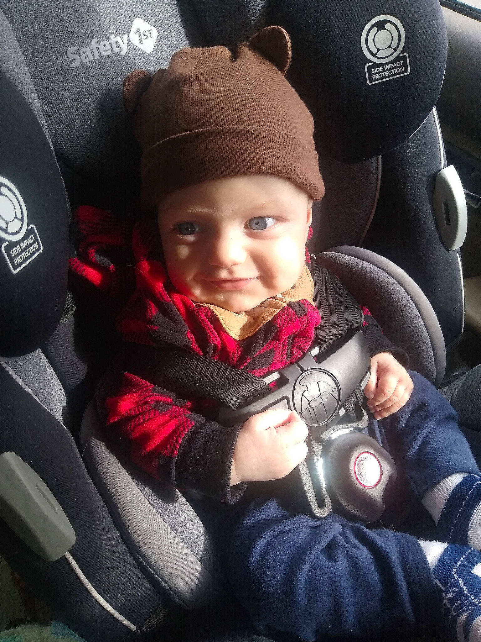 Liam joined the competition — help win amazing prizes! auto_part, automotive_design, baby, baby_carriage, baby_products, car_seat, car_seat_cover, child, comfort, cool, family_car, head_restraint, headwear, motor_vehicle, person, product, sitting, smile, steering_part, steering_wheel
