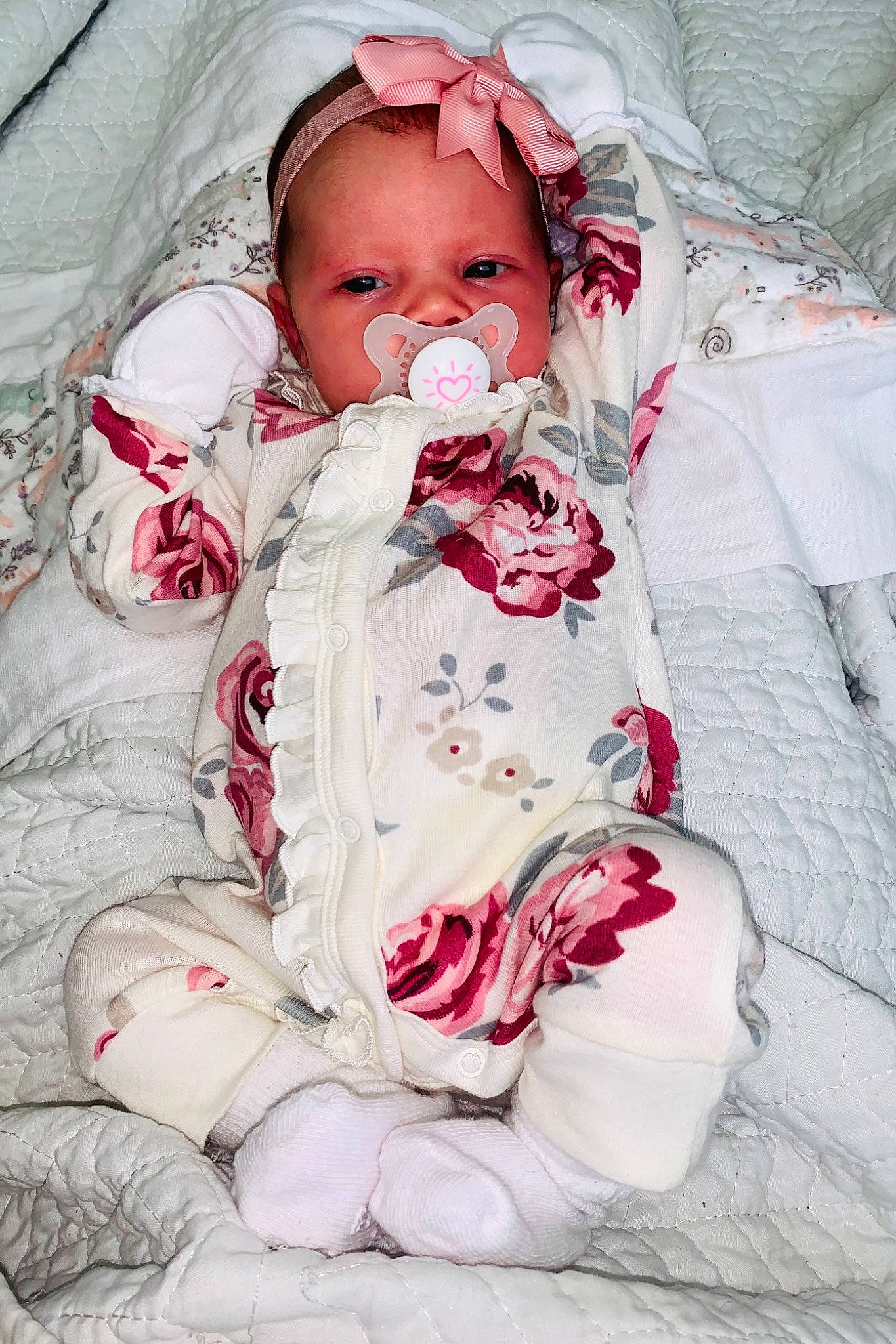 Hera joined the competition — help win amazing prizes! arm, baby, baby_toddler_clothing, cheek, child, comfort, dress, eye, hand, happy, human_body, linens, lip, pattern, person, petal, pink, skin, sleeve, textile