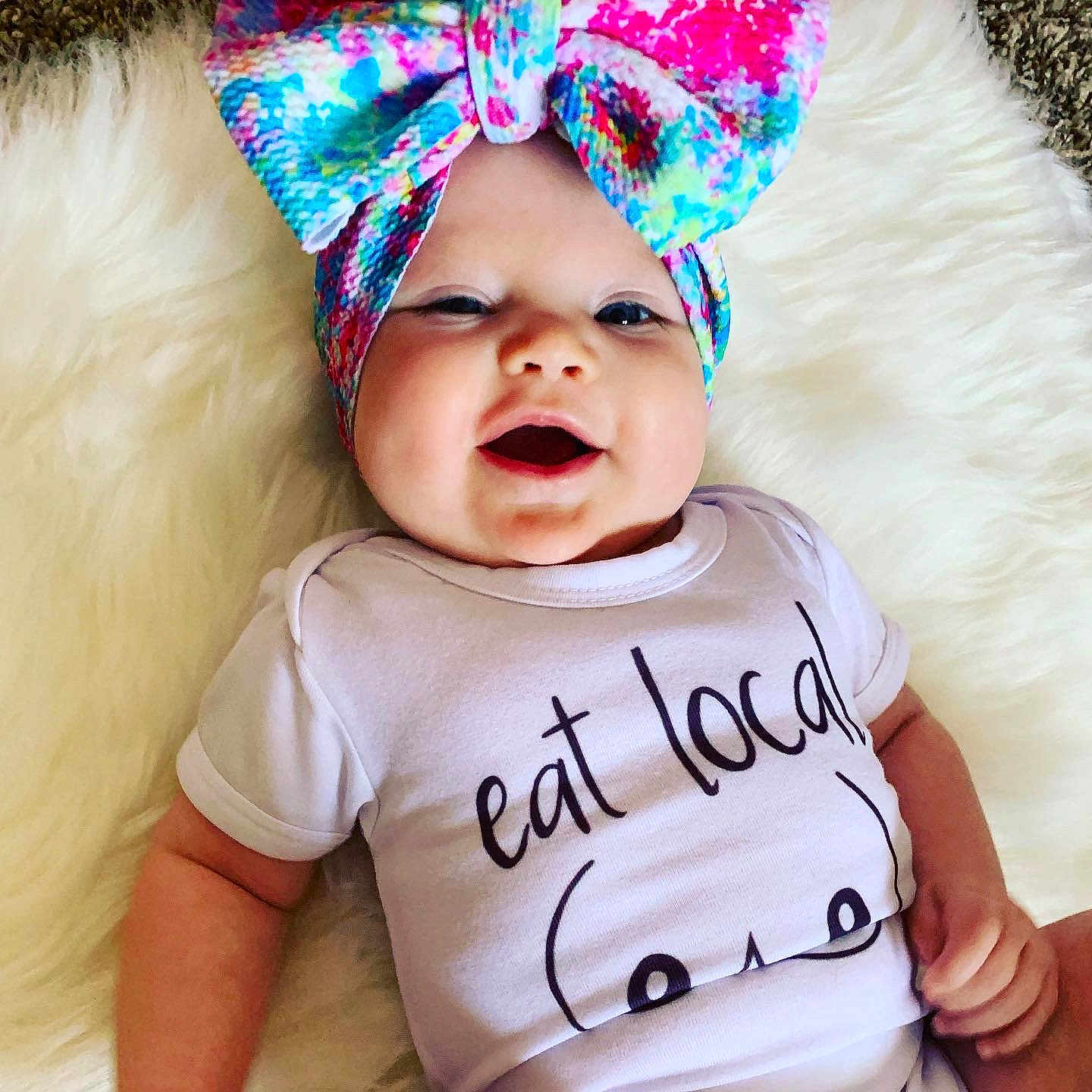 Hera is registered to the contest to win money with this photo: baby, baby_toddler_clothing, cap, child, cool, costume_hat, event, fun, happy, headband, headgear, headpiece, magenta, party_hat, pink, sleeve, smile, t_shirt, toddler, white