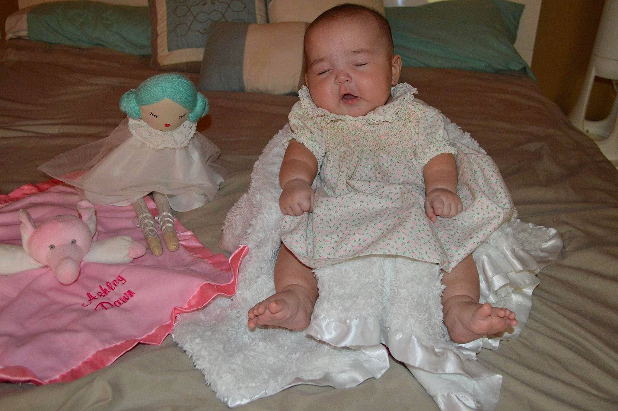 Ashley is registered to the contest to win money with this photo: baby, baby_toddler_clothing, child, person, pink, product, skin, textile, toddler