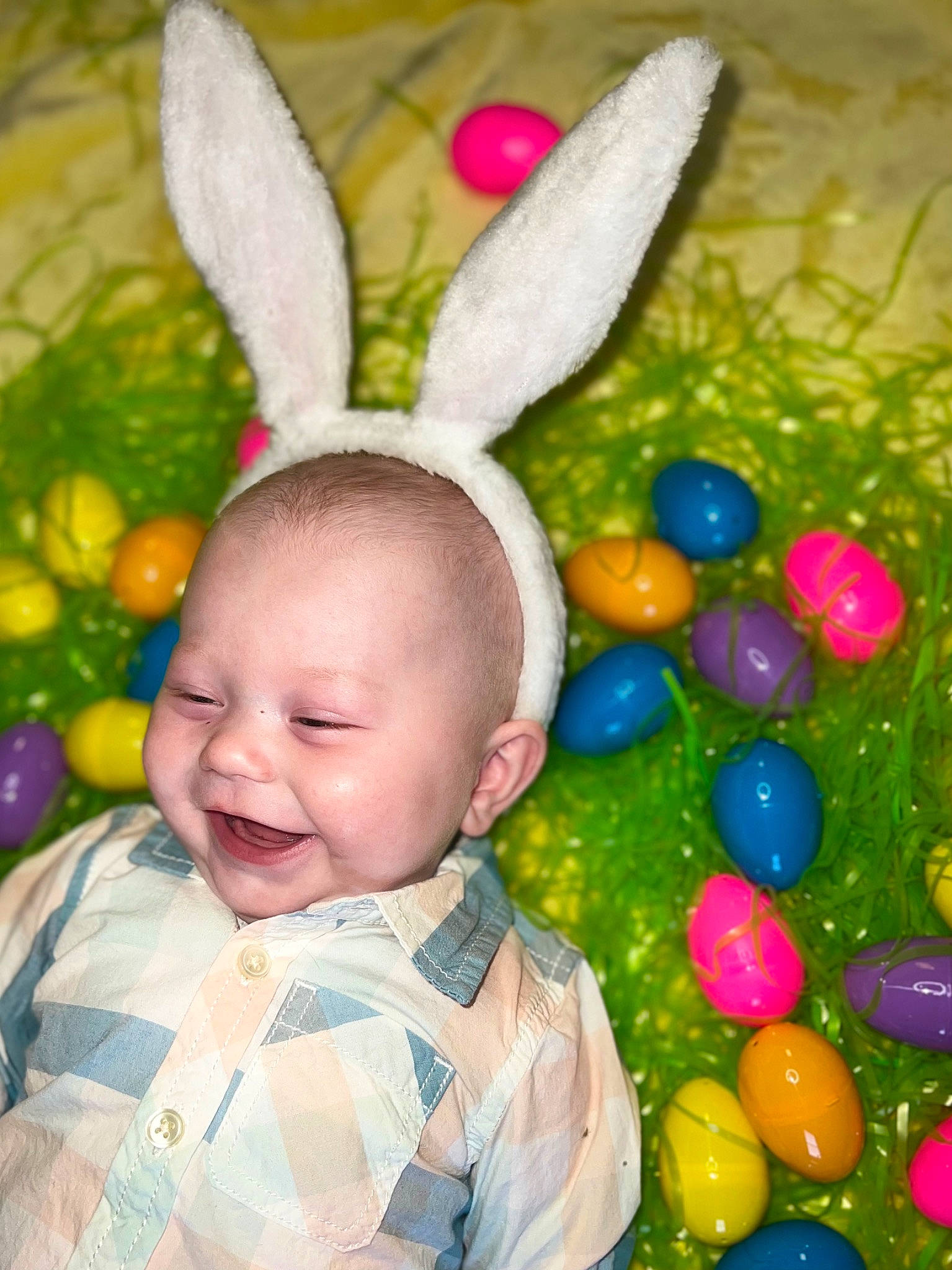 Malcolm is registered to the contest to win money with this photo: baby, baby_toddler_clothing, ball_pit, child, ear, event, eye, facial_expression, fun, grass, happy, nose, pattern, people_in_nature, person, play, smile, sweetness, textile, toddler