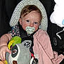 Feyre joined the competition — help win amazing prizes! baby, pacifier, car_seat, plush_toy, blanket, blue_eyes, child, infant, seatbelt, graco, pink_cloth, soft_toy, cute, face, person, closeup, indoors, sitting, holding, young_child