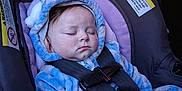 Feyre joined the competition — help win amazing prizes! baby, sleeping, car_seat, blue_outfit, hood, child, infant, seatbelt, safety, cozy, cute, peaceful, car_interior, hand, face, closed_eyes, clothing, child_safety, transportation, winter_wear
