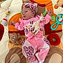 Linaya participe au concours pour gagner de l'argent avec cette photo : baby, pink_clothing, headband, toy_giraffe, teddy_bear, play_mat, infant, soft_toys, colorful, lying_down, child, cute, indoors, baby_toys, patterned_clothing, sock, hand, face, head, playtime