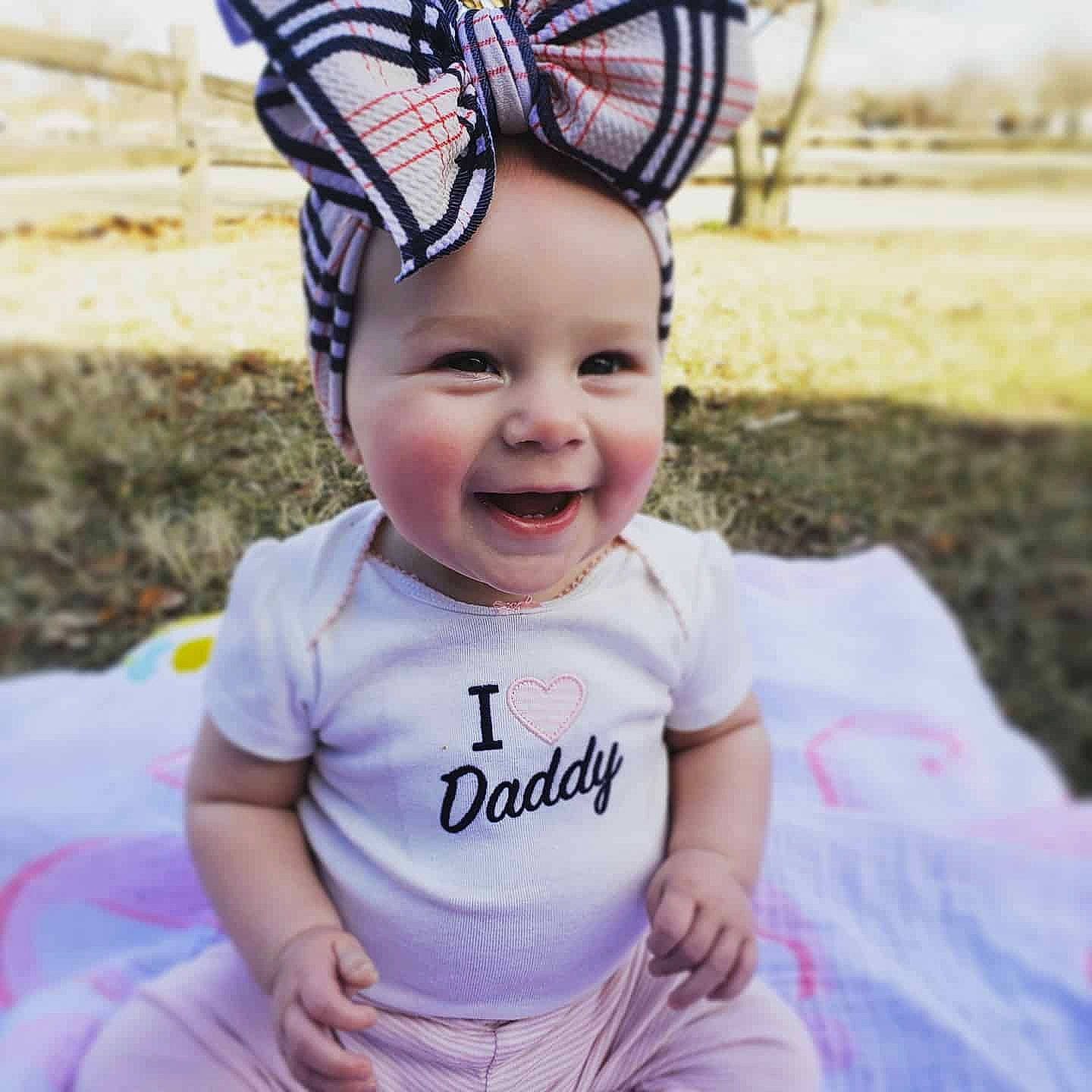 Kiah joined the competition — help win amazing prizes! baby, baby_toddler_clothing, cheek, child, cool, ear, face, facial_expression, fashion_accessory, forehead, fun, hair_accessory, happy, head, headgear, joy, person, photography, pink, smile