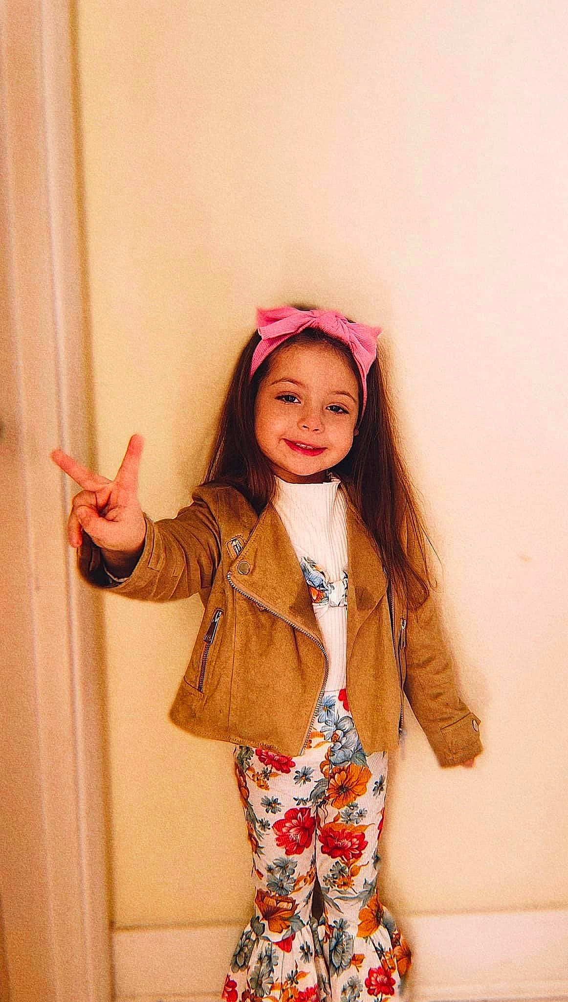 Jacqueline joined the competition — help win amazing prizes! arm, collar, face, fashion_design, fawn, gesture, hair, happy, head, joy, lip, neck, outerwear, person, pink, shoulder, skin, sleeve, smile, street_fashion