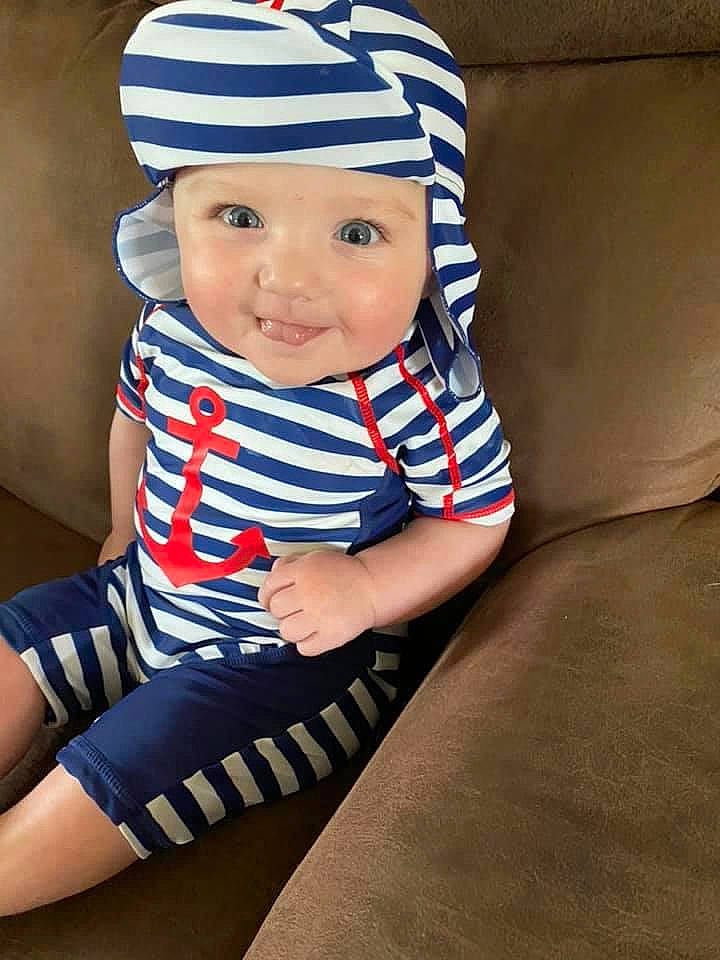 Brantley is registered to the contest to win money with this photo: baby, baby_products, baby_toddler_clothing, cap, child, hat, headgear, headwear, person, sleeve, toddler