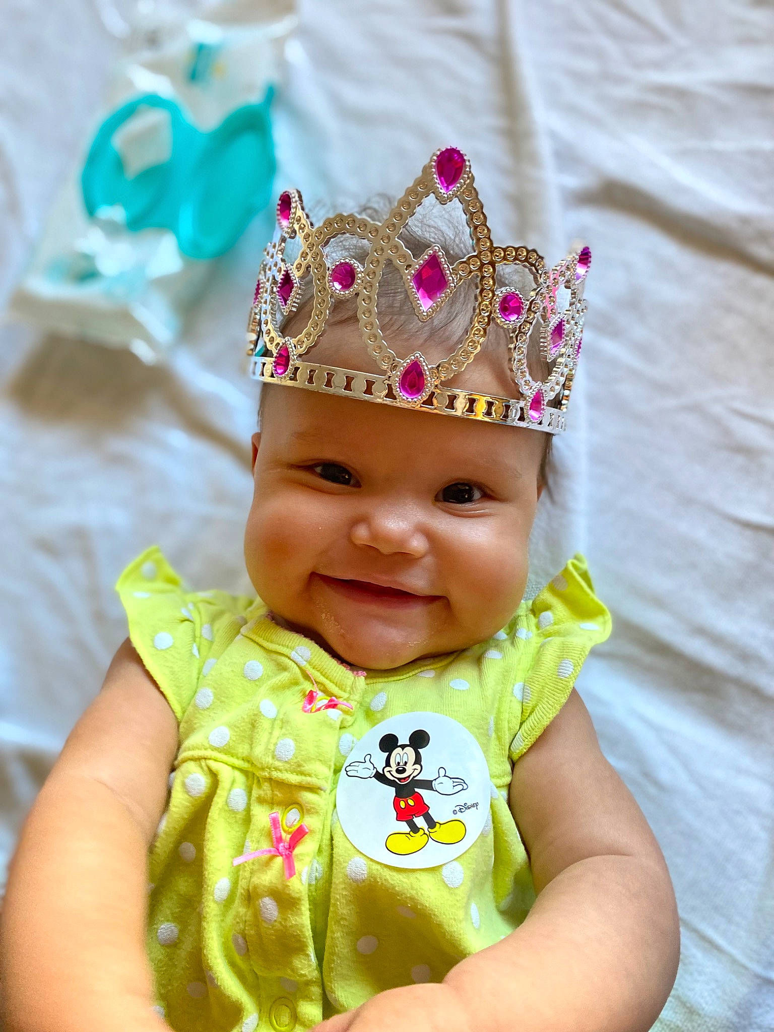Loveah is registered to the contest to win money with this photo: baby, baby_toddler_clothing, cap, costume_hat, crown, event, face, fun, happy, hat, headpiece, headwear, joy, magenta, party_hat, party_supply, people_in_nature, person, pink, recreation