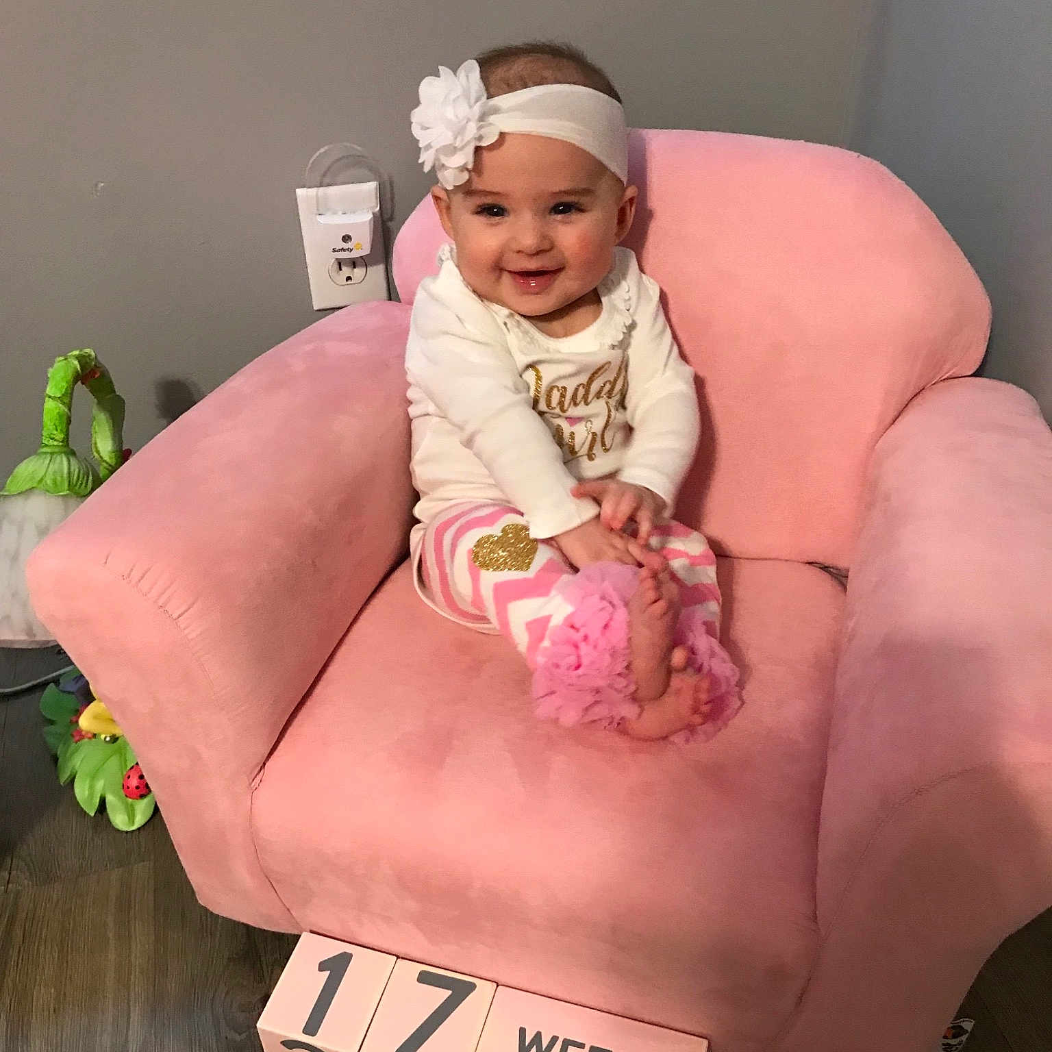 Austyn is registered to the contest to win money with this photo: baby, birth, child, furniture, headwear, joy, person, pink, sitting, toddler