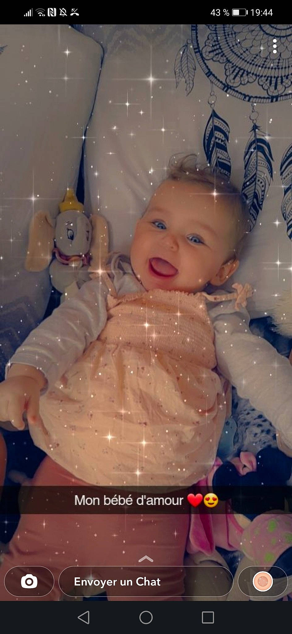 Hëlyana a rejoint le concours — aidez-le/la à gagner de superbes lots ! baby, baby_toddler_clothing, cheek, child, christmas, christmas_eve, christmas_ornament, event, fun, happy, holiday, human_body, iris, lighting, ornament, person, pink, sitting, smile, toddler