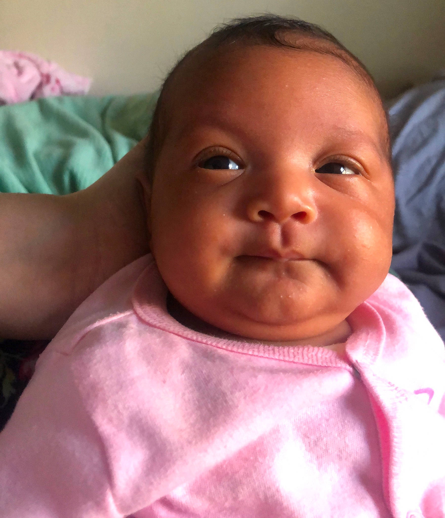 Lux is registered to the contest to win money with this photo: baby, baby_making_funny_faces, cheek, child, chin, close_up, eye, eyebrow, face, facial_expression, forehead, happy, head, lip, mouth, nose, person, pink, skin, smile