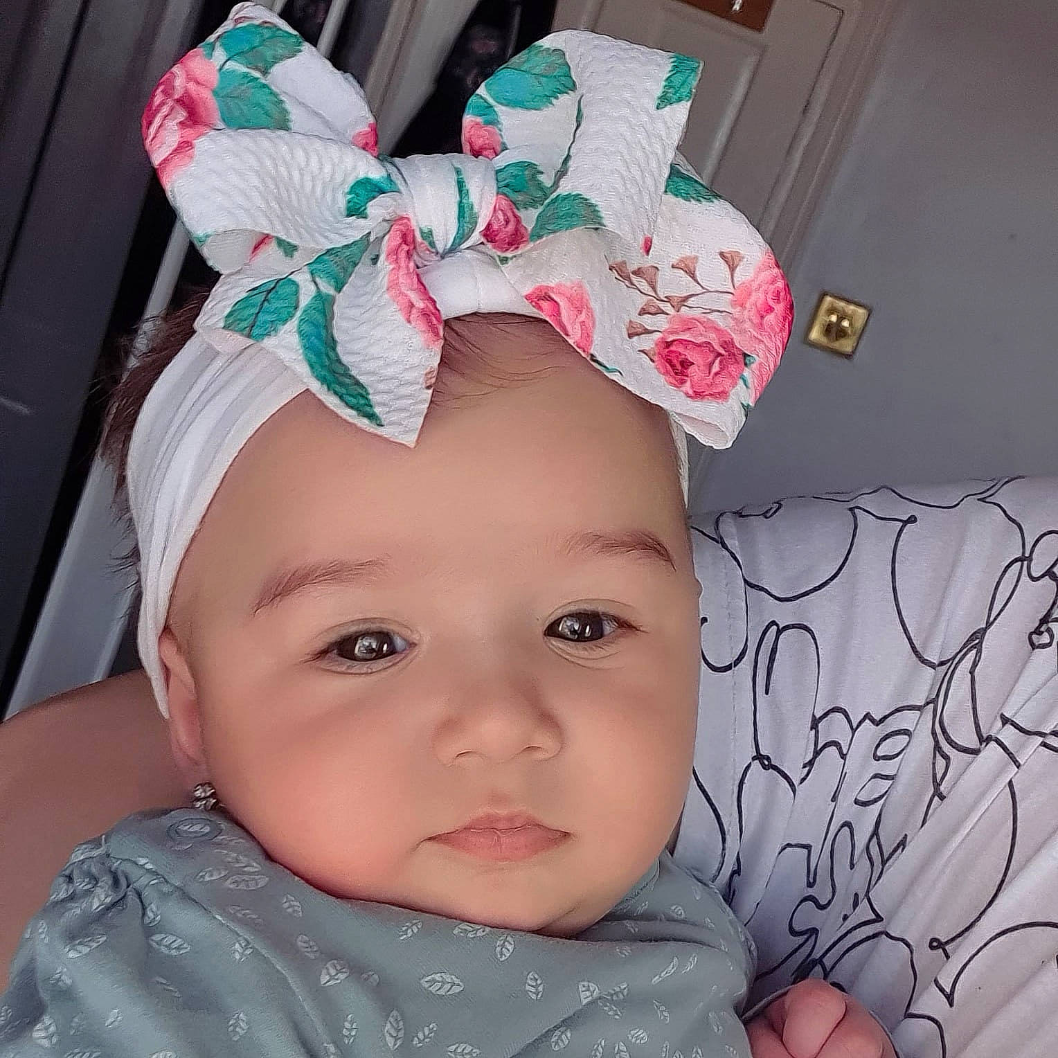 Sara is registered to the contest to win money with this photo: baby, baby_toddler_clothing, cap, cheek, child, costume_accessory, costume_hat, ear, eyelash, fashion_accessory, hair_accessory, happy, headband, headgear, headpiece, headwear, magenta, pattern, person, pink