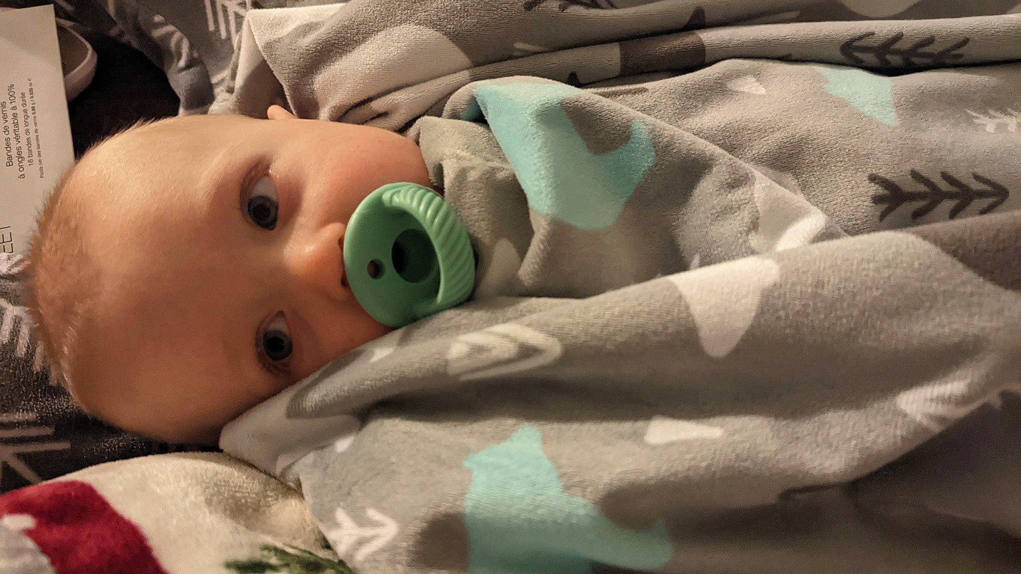 Forrest is registered to the contest to win money with this photo: baby, baby_products, baby_safety, baby_sleeping, baby_toddler_clothing, bedding, cheek, child, comfort, eyebrow, eyelash, head, linens, mouth, nose, pattern, person, room, skin, sleeve