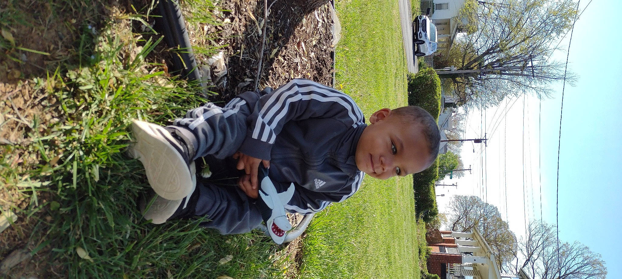 Elijah joined the competition — help win amazing prizes! baby, baby_toddler_clothing, botany, child, fun, grass, happy, hat, jacket, leaf, leisure, person, plant, recreation, shoe, sitting, sky, sneakers, spring, toddler