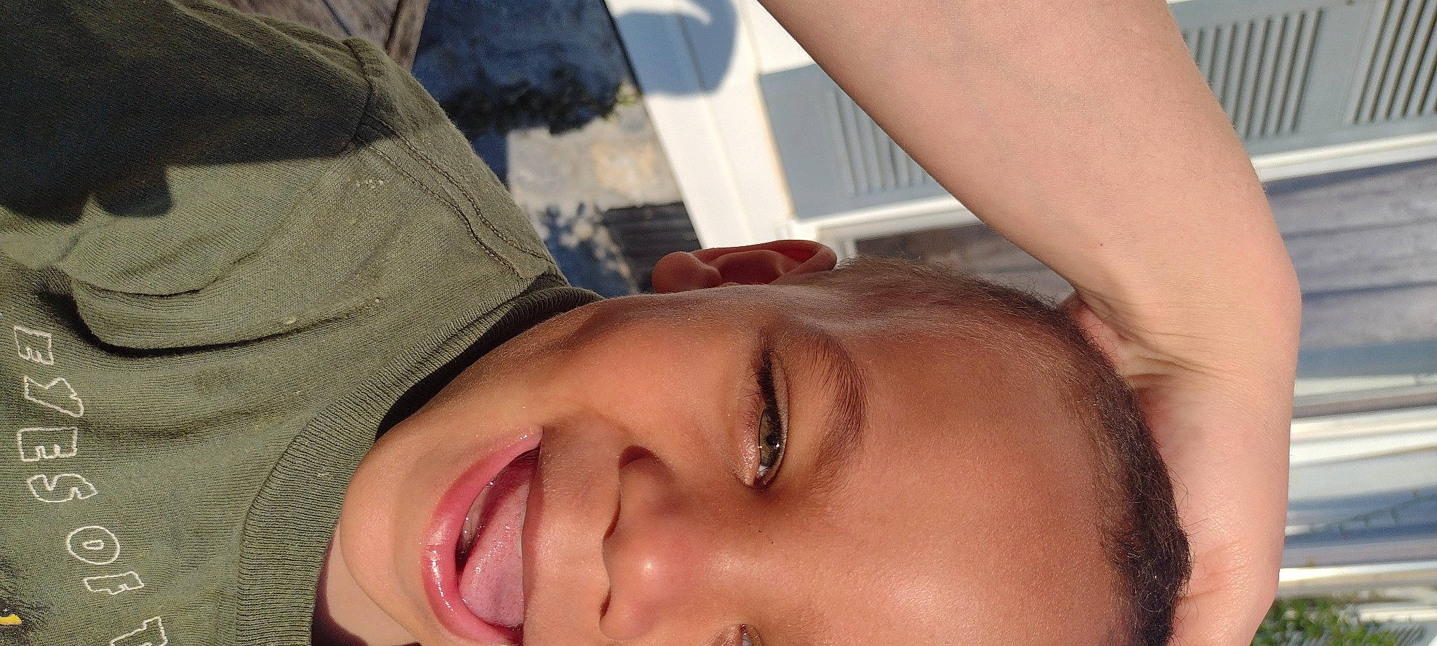 Elijah is registered to the contest to win money with this photo: chin, ear, eye, eyebrow, eyelash, finger, forehead, glasses, hand, happy, human_body, jaw, lip, mouth, muscle, neck, nose, person, skin, smile