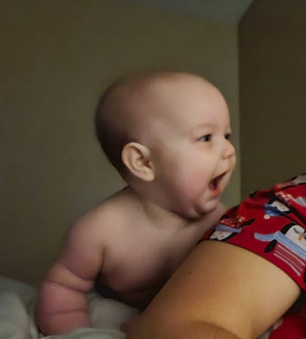 Opal is registered to the contest to win money with this photo: abdomen, baby, baby_toddler_clothing, cheek, chest, child, comfort, ear, elbow, eye, eyelash, happy, human_body, iris, neck, nose, person, sitting, stomach, toddler