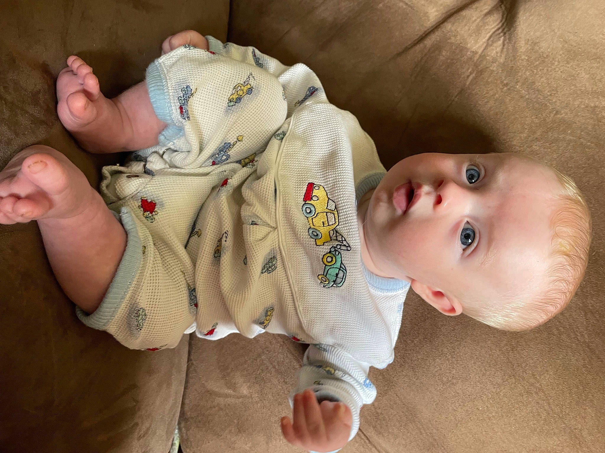 Augustus joined the competition — help win amazing prizes! baby, baby_products, baby_toddler_clothing, cheek, child, comfort, elbow, eyelash, facial_expression, flooring, foot, head, human_body, mouth, nose, person, sitting, skin, sleeve, surprise