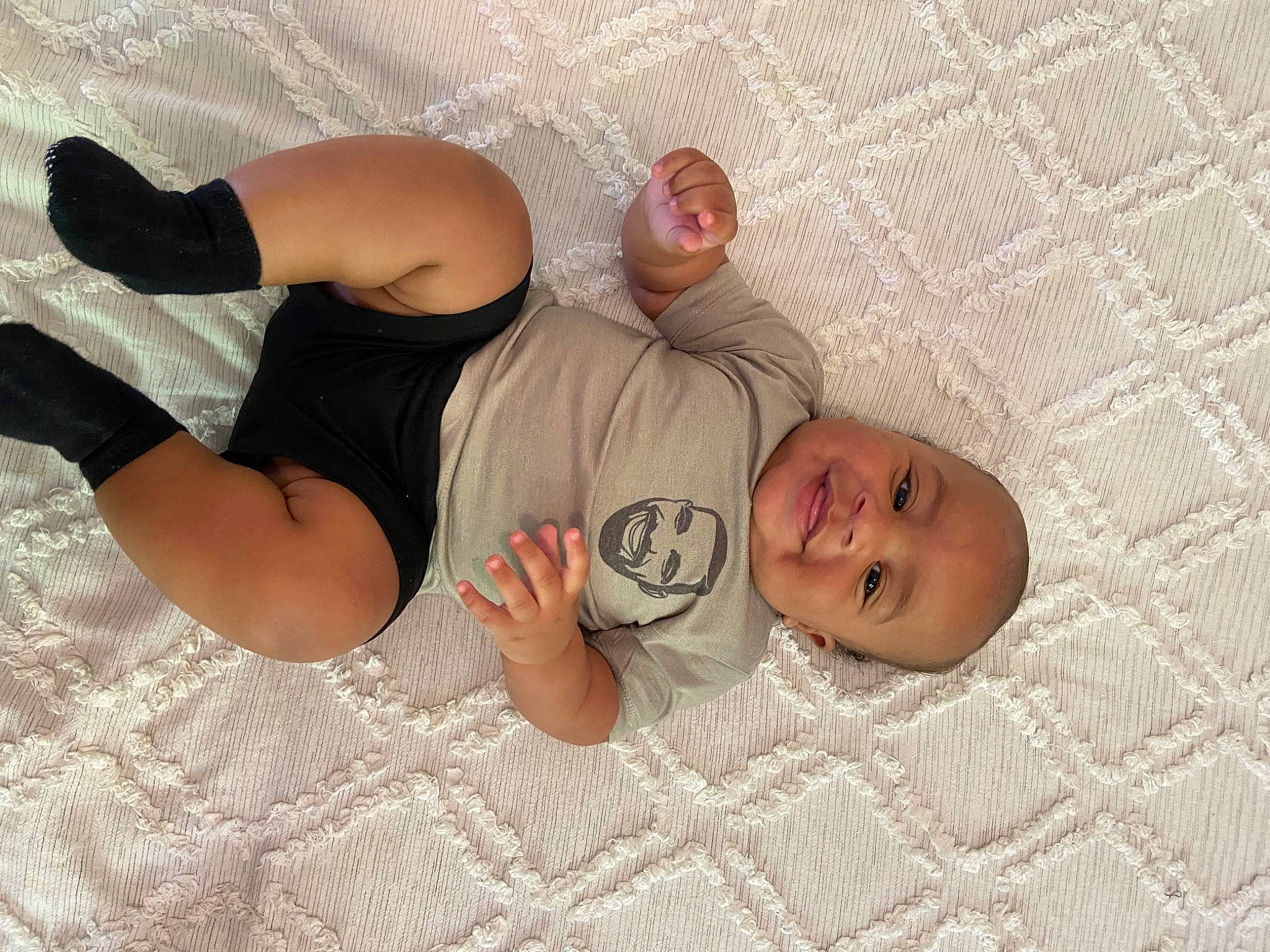 Vincenzo is registered to the contest to win money with this photo: arm, baby, chest, comfort, elbow, eye, finger, foot, hand, head, human_body, joy, knee, leg, linens, mouth, person, skin, stomach, thigh