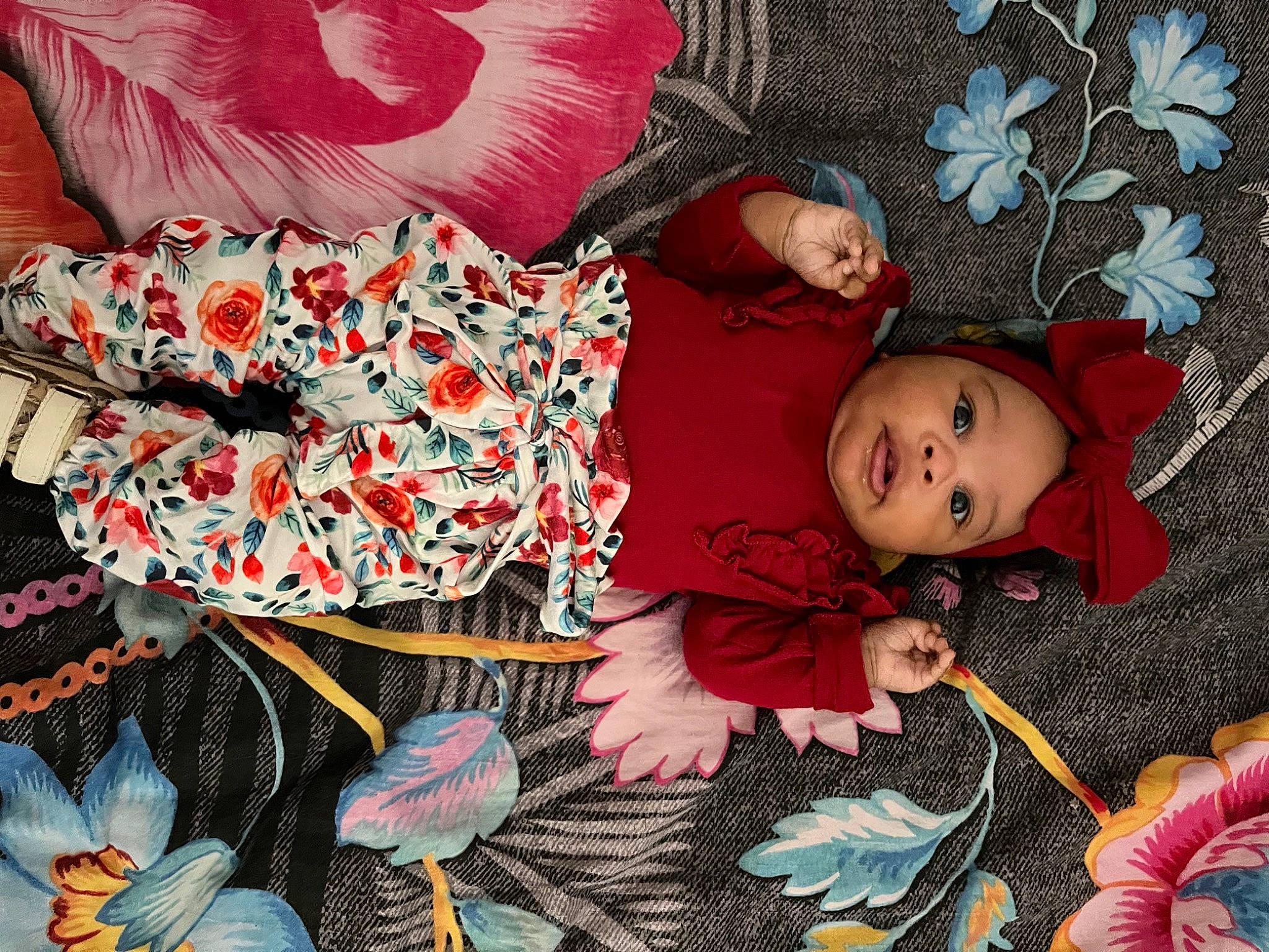 Tyana participe au concours pour gagner de l'argent avec cette photo : child, comfort, doll, event, fashion, happy, head, human_body, lap, linens, pattern, people, person, pink, plant, product, room, textile, toddler, toy