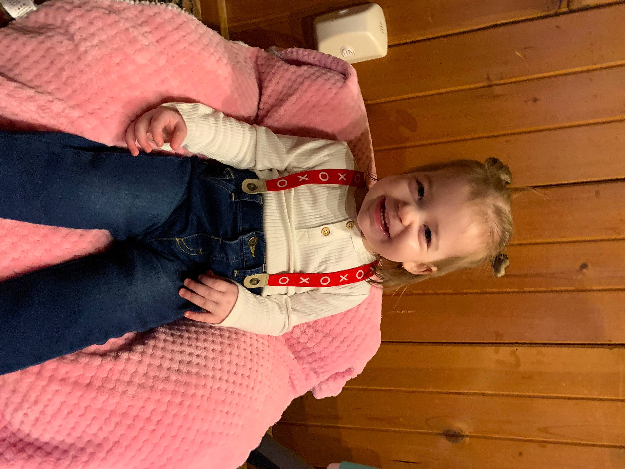 Selena joined the competition — help win amazing prizes! arm, baby_toddler_clothing, child, comfort, elbow, facial_expression, fun, happy, hardwood, joy, lap, pattern, person, sitting, smile, thumb, toddler, varnish, wood, wood_stain