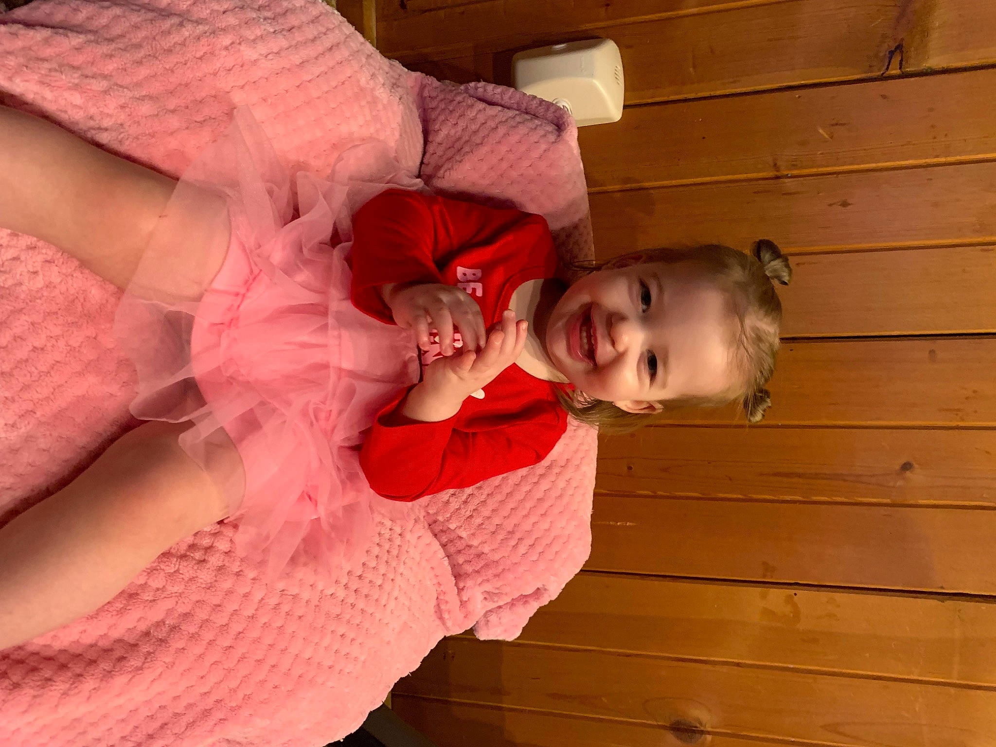 Selena joined the competition — help win amazing prizes! abdomen, baby, baby_toddler_clothing, child, comfort, embellishment, event, flesh, fun, happy, hardwood, joy, magenta, pattern, peach, person, room, smile, toddler, varnish