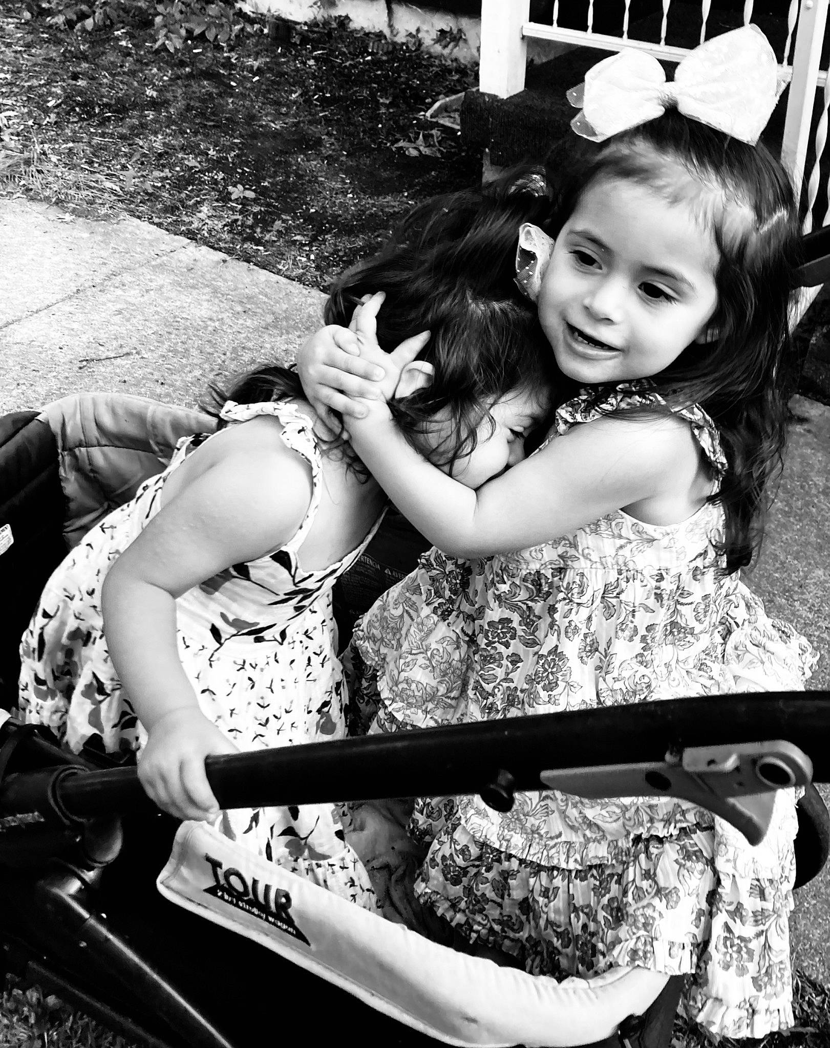 Annalise joined the competition — help win amazing prizes! beauty, black, black_and_white, black_hair, flash_photography, friendship, fun, hairstyle, happy, interaction, monochrome, monochrome_photography, person, photograph, plant, smile, snapshot, style, thigh, toddler