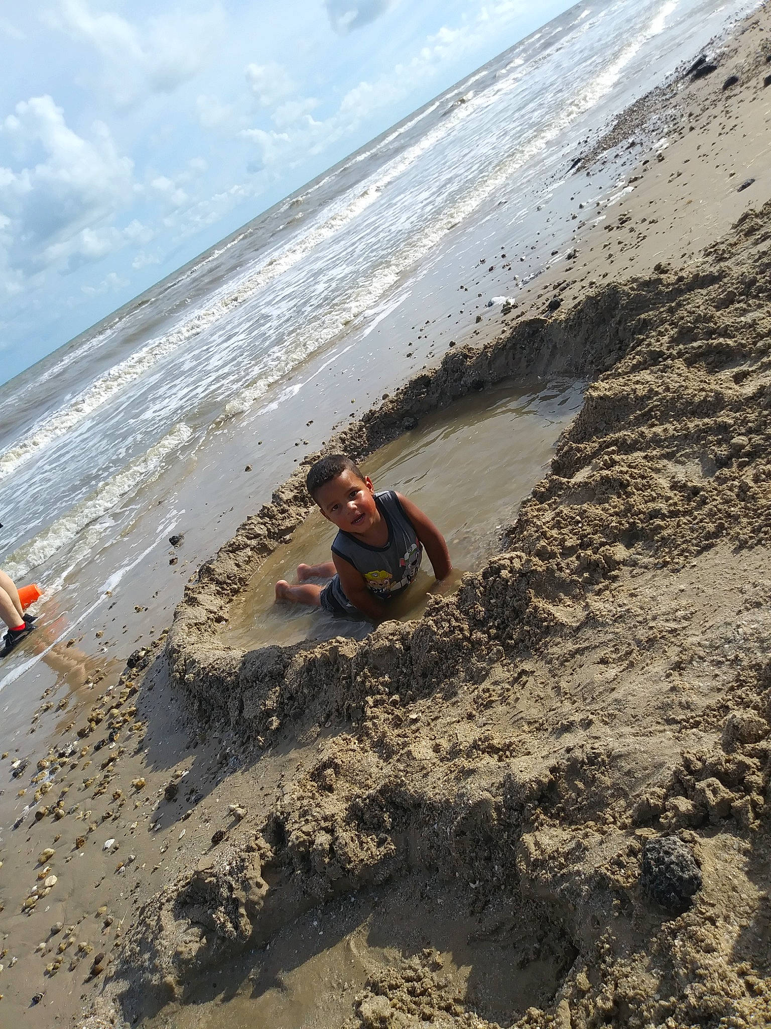 Titus joined the competition — help win amazing prizes! bay, beach, coast, coastal_and_oceanic_landforms, fun, mud, mudflat, ocean, person, sand, sea, shore, soil, tide, vacation, wave