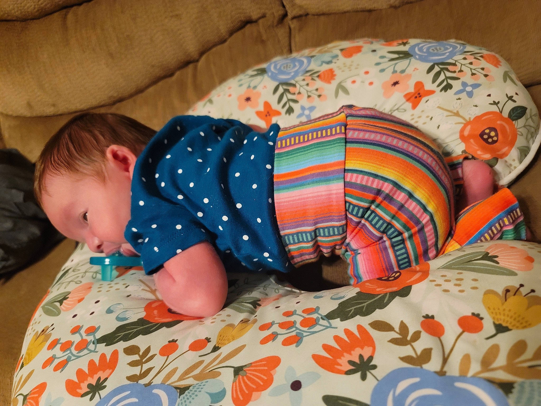 Willow joined the competition — help win amazing prizes! arm, baby, baby_toddler_clothing, bedding, child, comfort, couch, flooring, head, headgear, human_body, linens, orange, pattern, person, product, sleeve, textile, toddler, toy