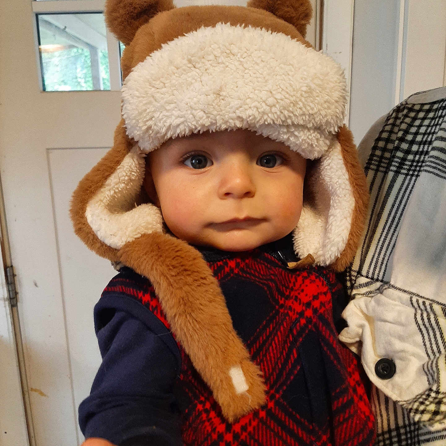 Noah joined the competition — help win amazing prizes! adult, baby, bodypart, bonnet, cap, clothing, couch, face, finger, furniture, hand, hat, head, homedecor, hood, male, man, person, photography, portrait