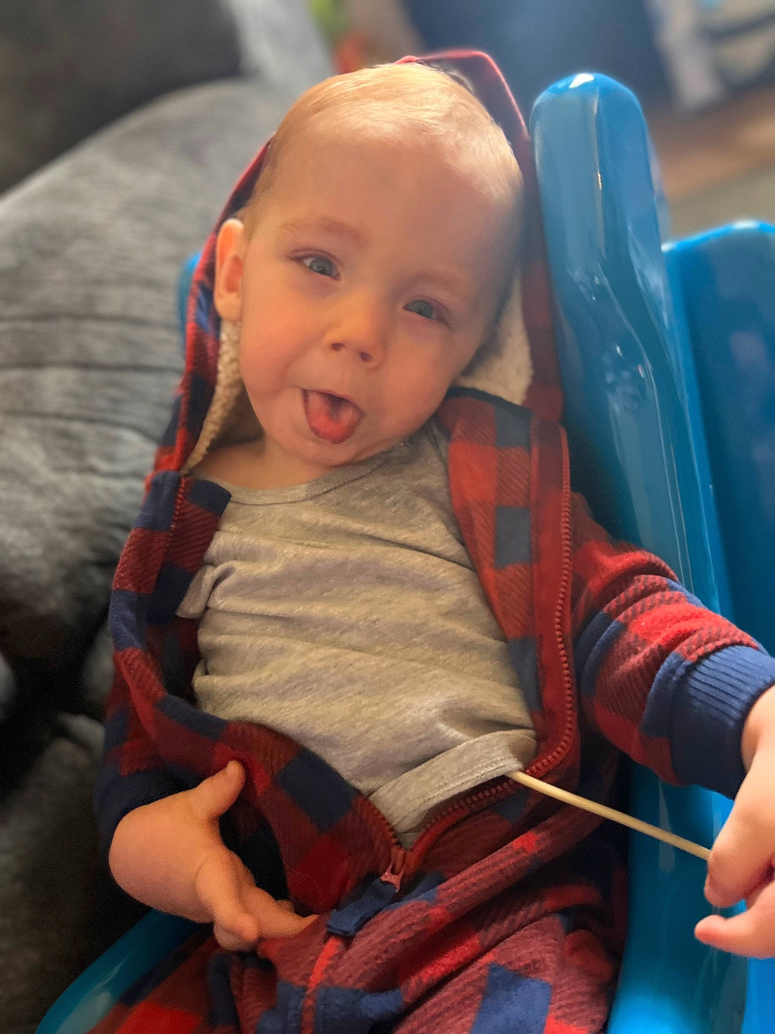 Xzavier is registered to the contest to win money with this photo: baby, baby_carriage, baby_products, baby_toddler_clothing, cheek, child, comfort, eye, facial_expression, fun, head, human_body, iris, nose, orange, person, product, seat_belt, sitting, skin