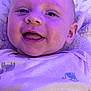 Walker joined the competition — help win amazing prizes! baby, infant, smiling, face, onesie, clothing, monkey_print, closeup, happy, tongue, head, skin, portrait, child, cute, expression, lying_down, fabric, purple_light, soft_lighting