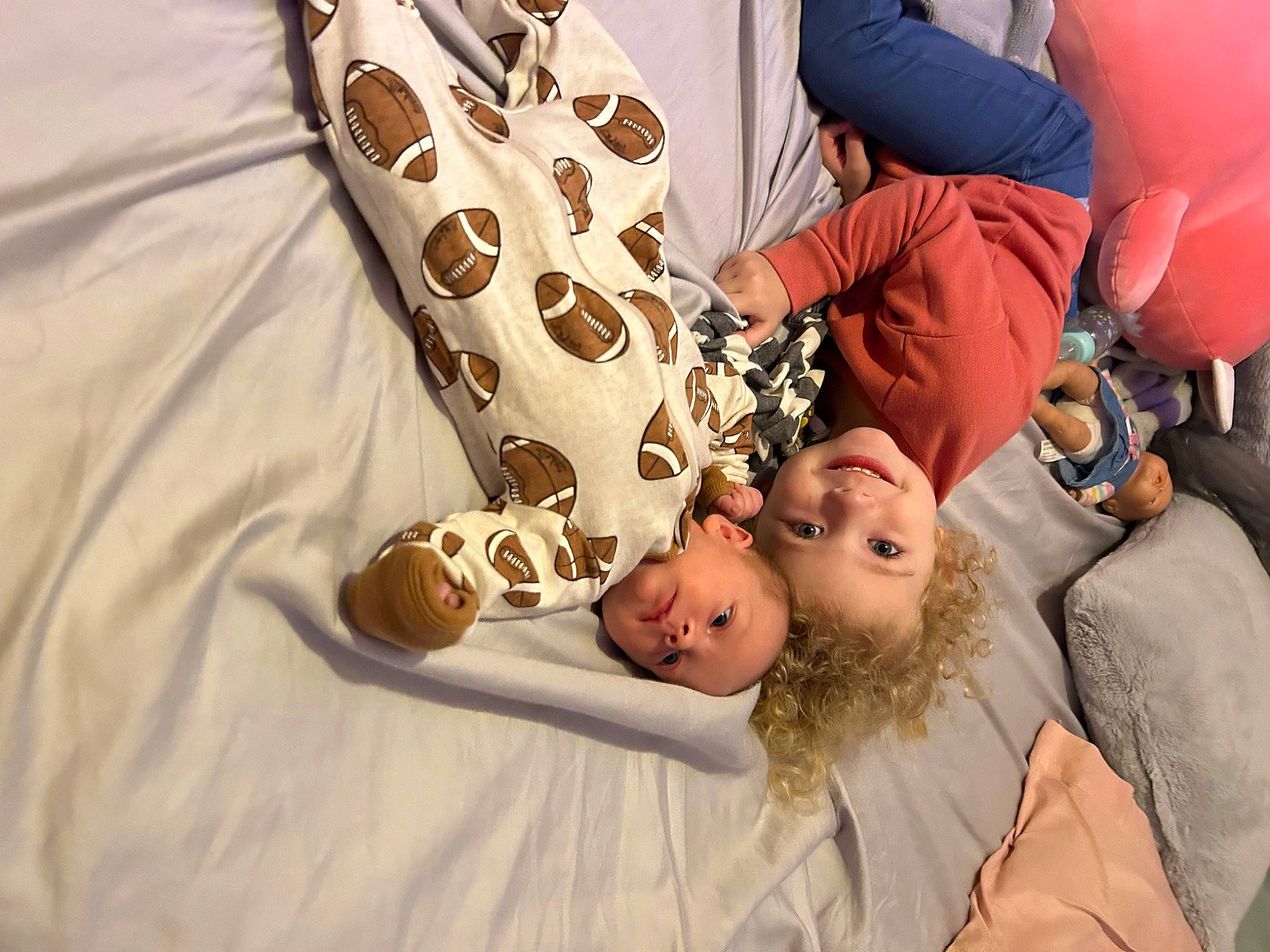 Allison is registered to the contest to win money with this photo: abdomen, bedding, child, comfort, event, fun, gesture, happy, joint, joy, leisure, linens, person, room, textile, tree, vacation