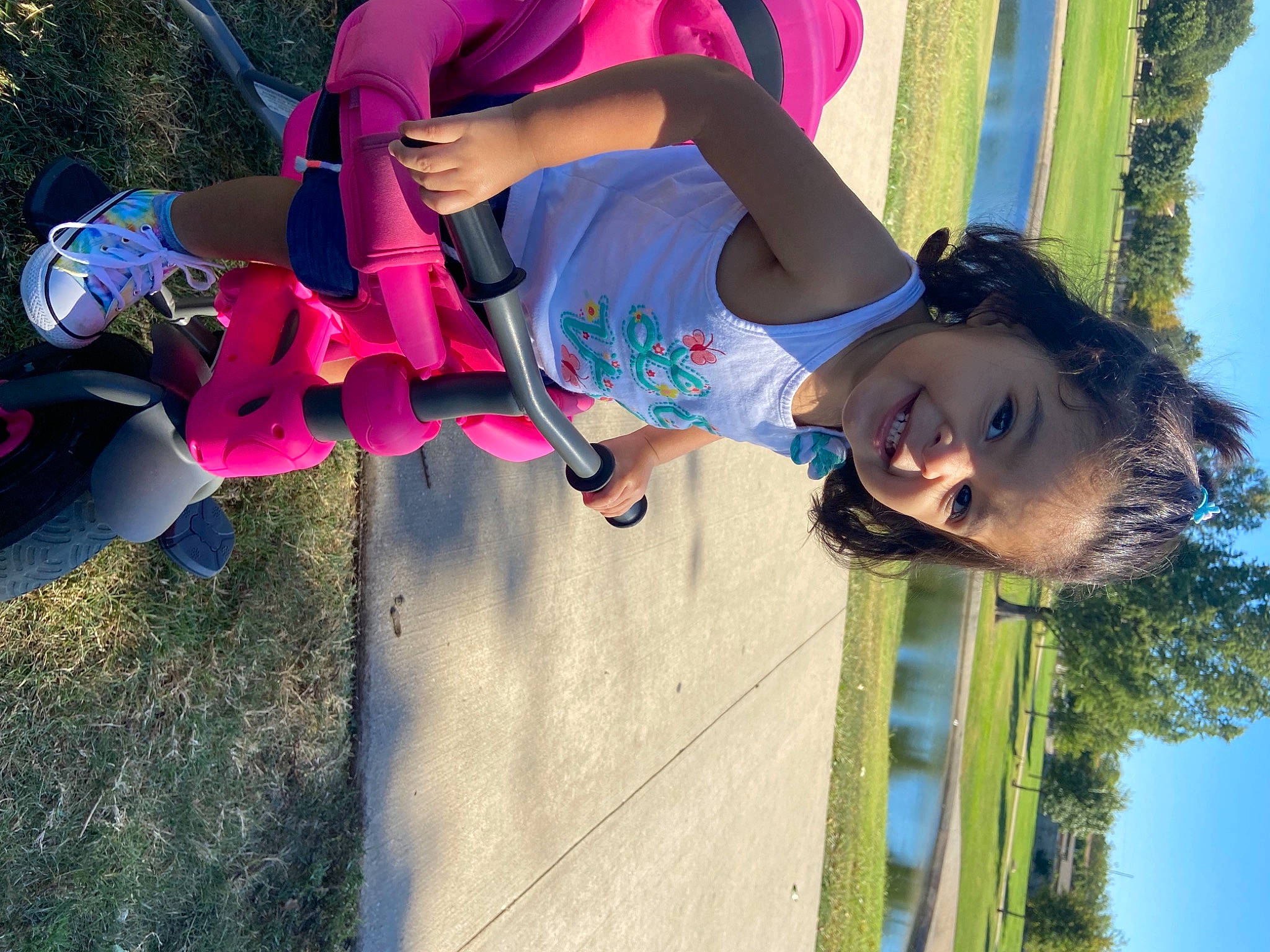 Alanna is registered to the contest to win money with this photo: beauty, blue, cool, electric_blue, fun, grass, happy, joy, leaf, leisure, magenta, morning, people_in_nature, person, pink, plant, recreation, sky, smile, sunlight