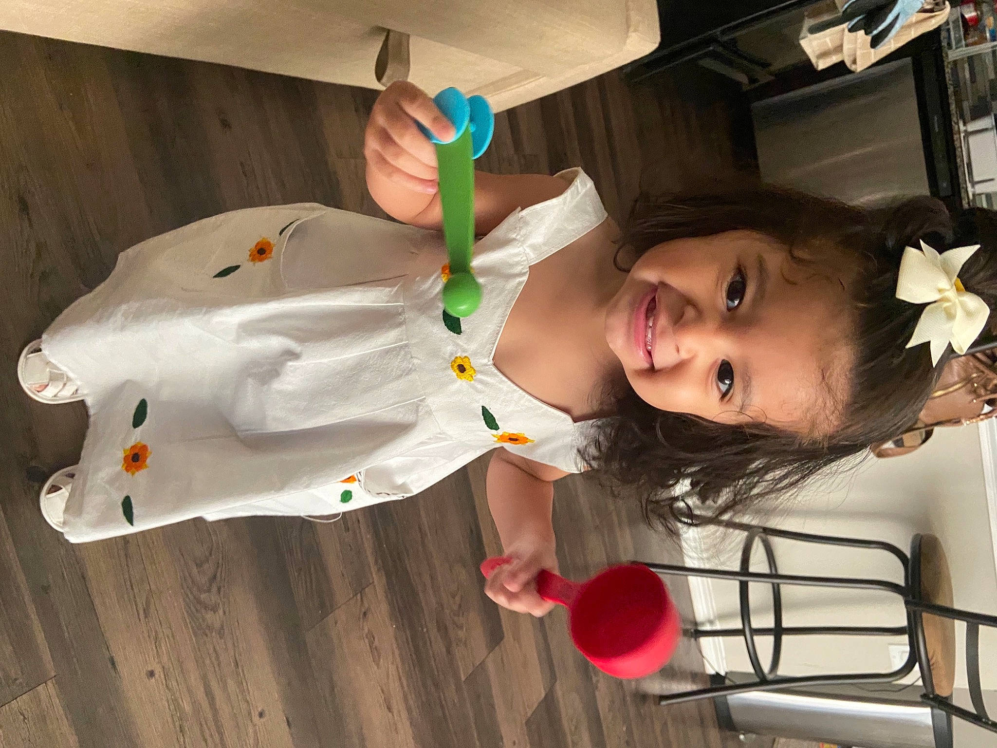 Alanna joined the competition — help win amazing prizes! baby, baby_toddler_clothing, child, costume, eye, facial_expression, fun, happy, hat, headgear, joy, organ, person, petal, room, sleeve, smile, toddler, toy, white